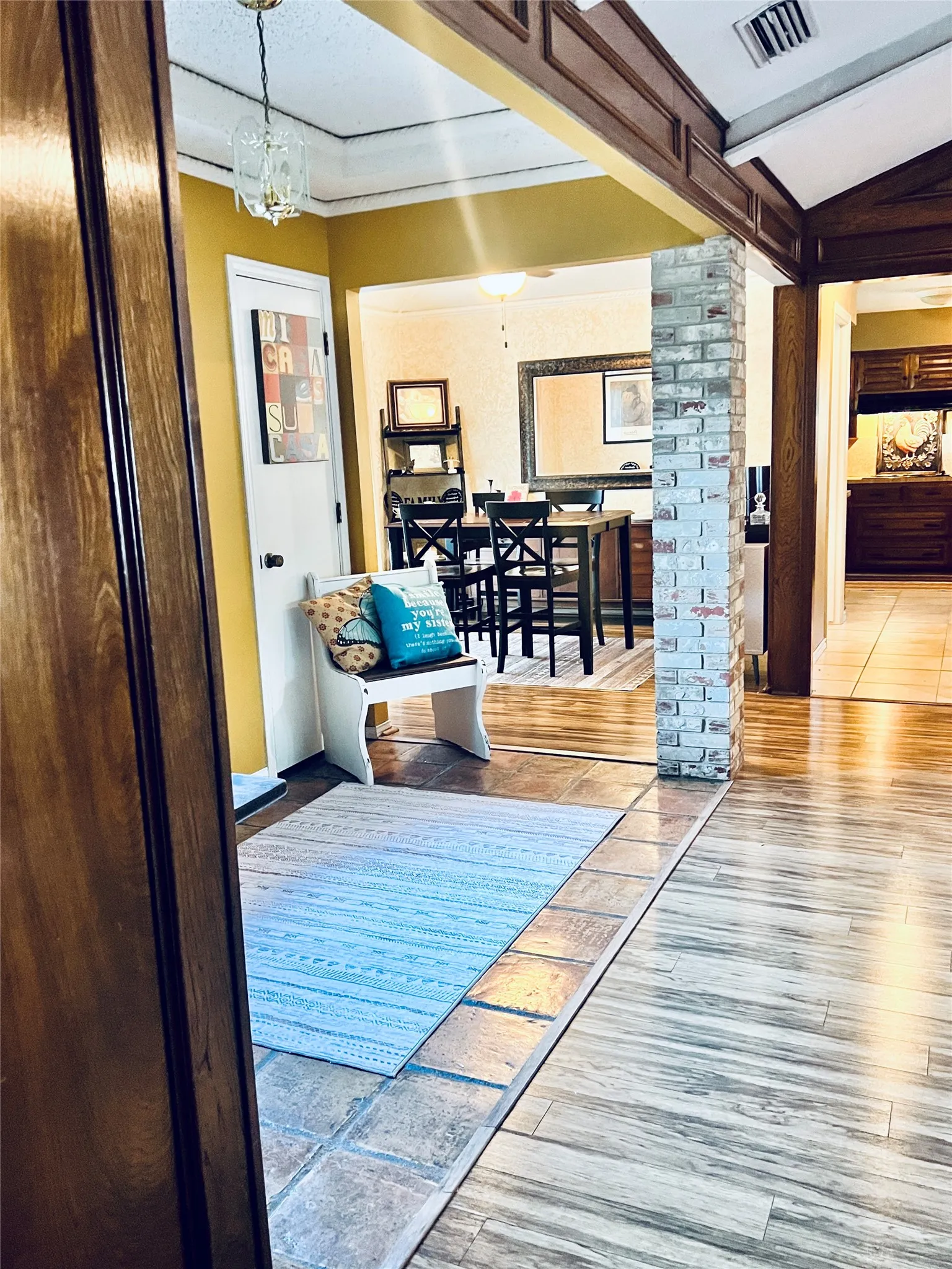 Entrance foyer view toward dining area and kitchen