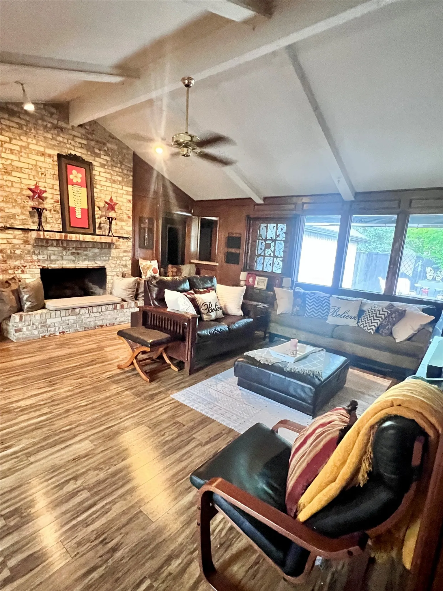 Fireplace, sliding patio doors and tall ceilings