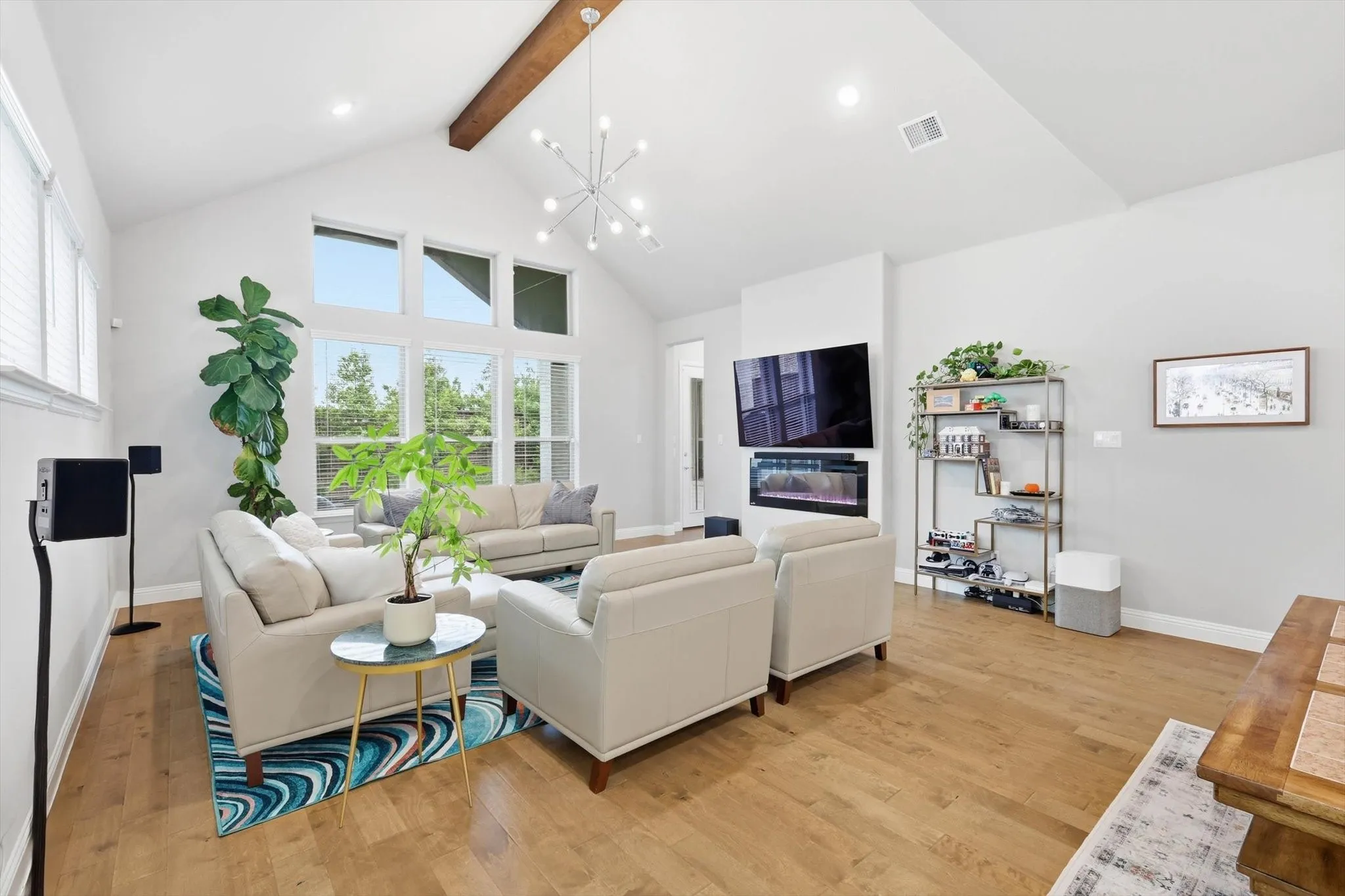 Walls of windows that flood the space with natural light while seamlessly connecting to the private backyard.