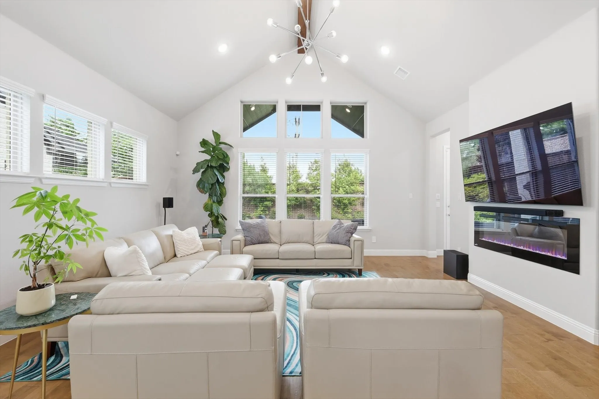 Walls of windows that flood the space with natural light while seamlessly connecting to the private backyard.