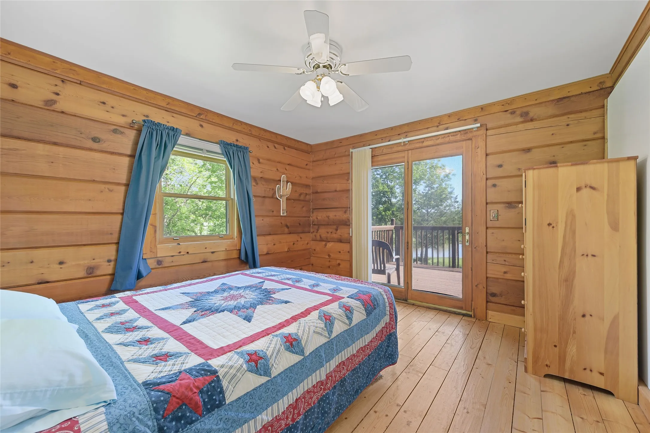 Main Level Guest Bedroom with door to Deck.