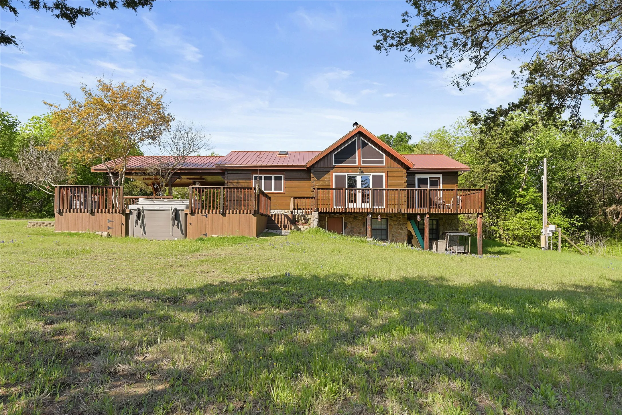 Swim Spa, Deck, Lower Level walkout from second Living/Recreation Room.