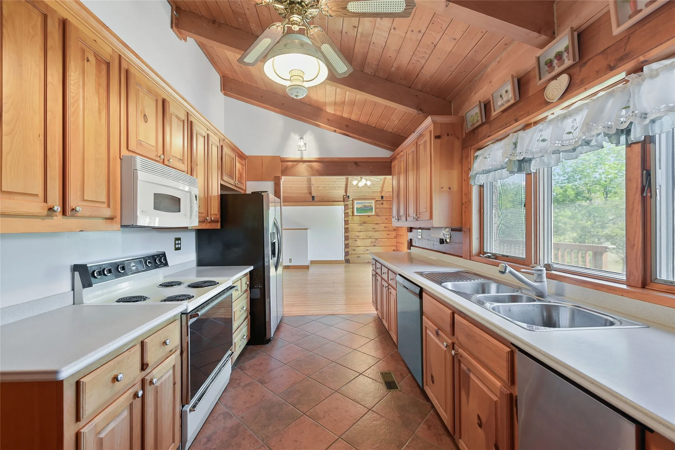 View of kitchen upon entering home. View of Great Room.