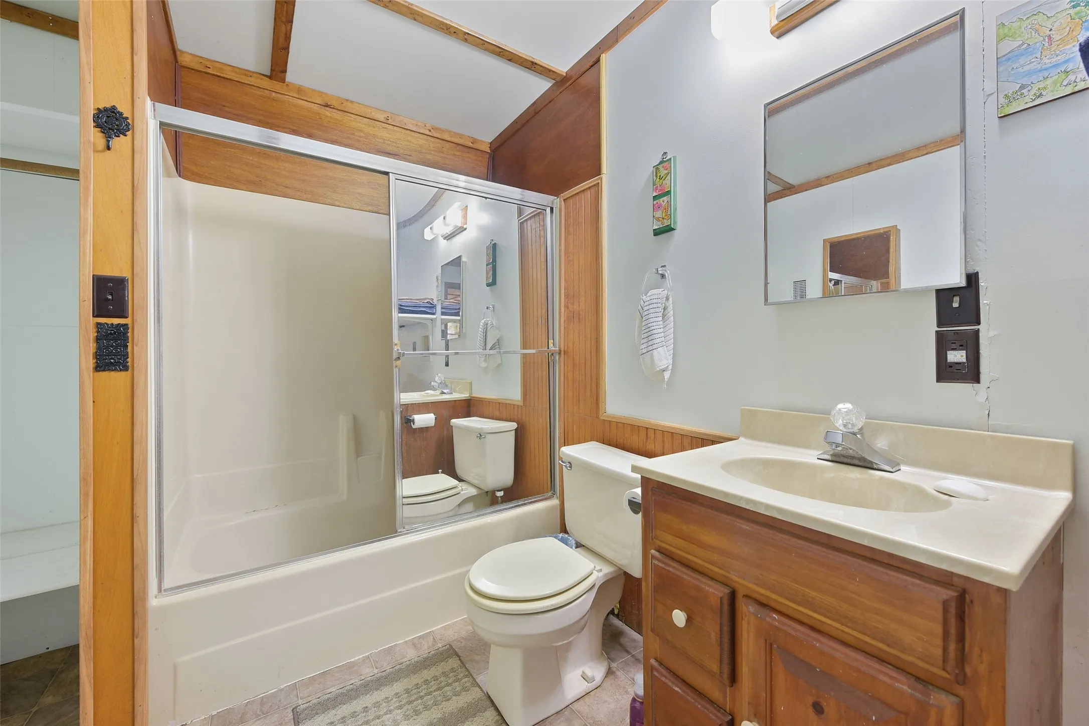 Apartment Full bath featuring shower / washtub combination, toilet, and vanity