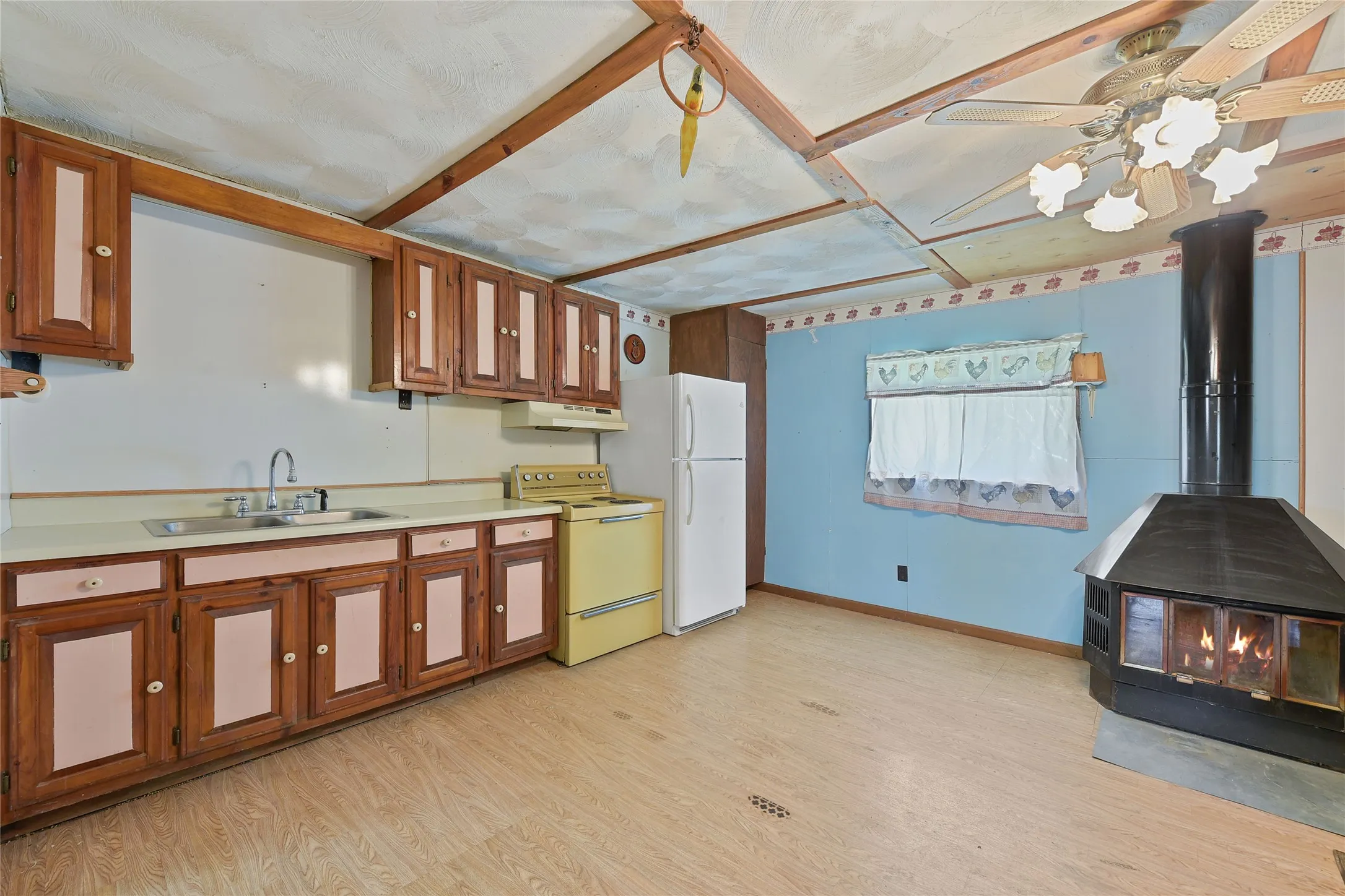 1 Bedroom Apartment. Includes, Free standing Fireplace, and Refrigerator.