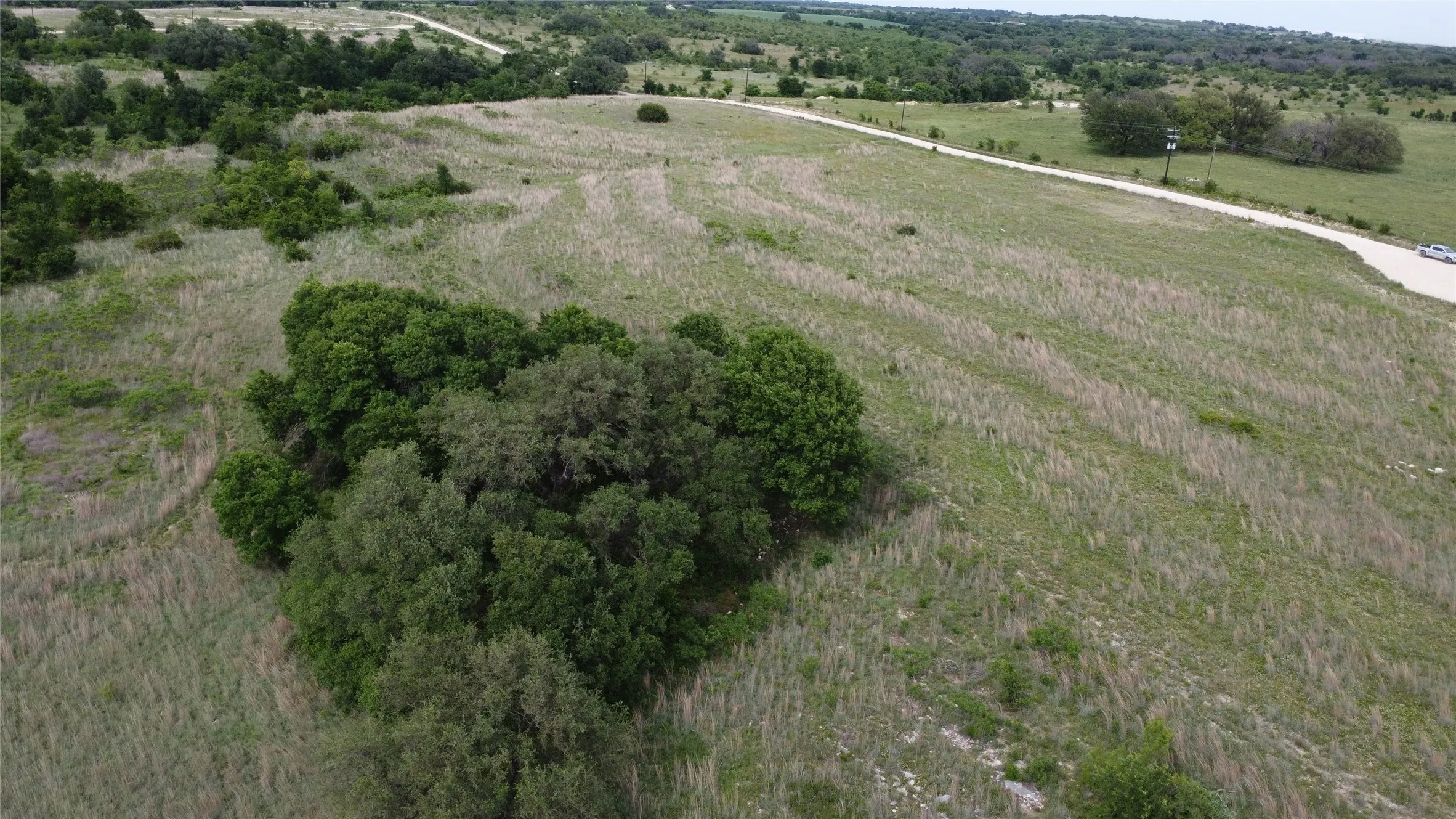 Back right corner of property facing towards county road coming into property.