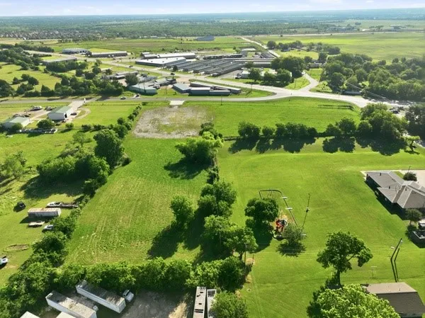 Expansive green acreage featuring a large, undeveloped parcel