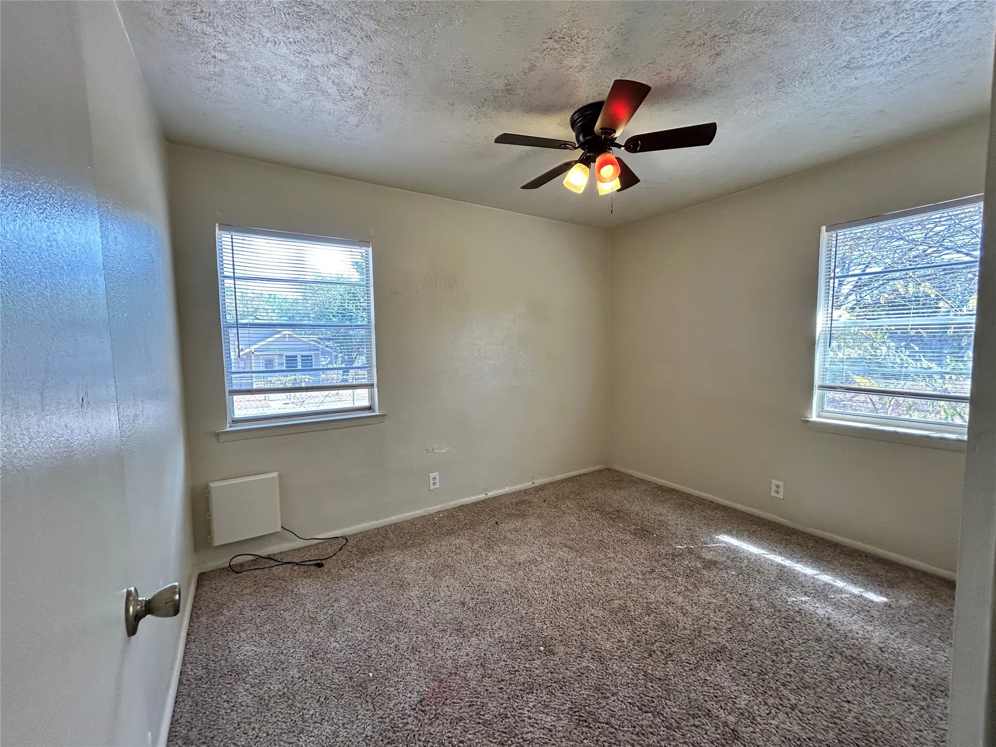 Additional content. Great bedroom with lots of windows to view the outside.