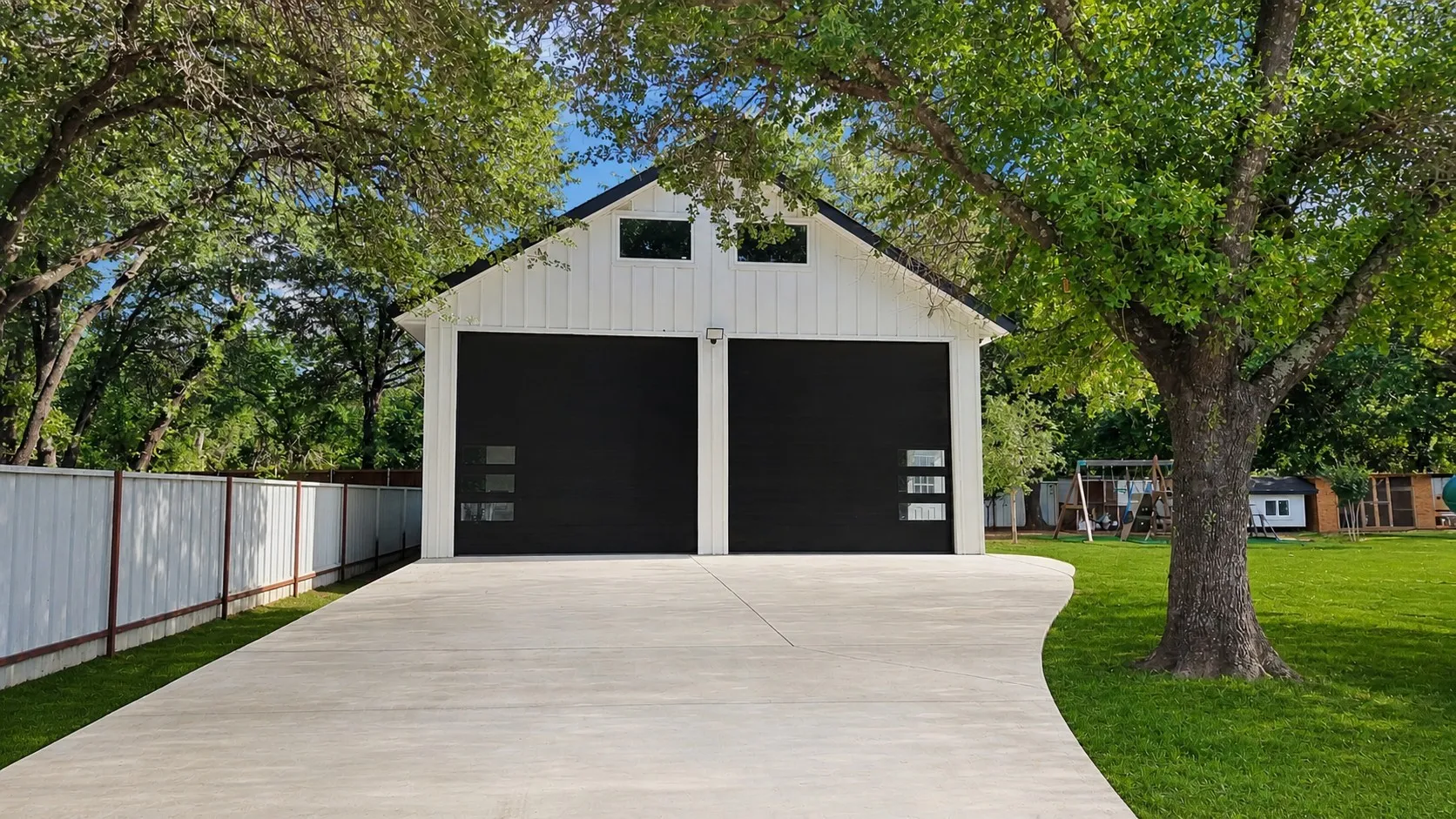 Climate-controlled three-level RV garage with double-height design