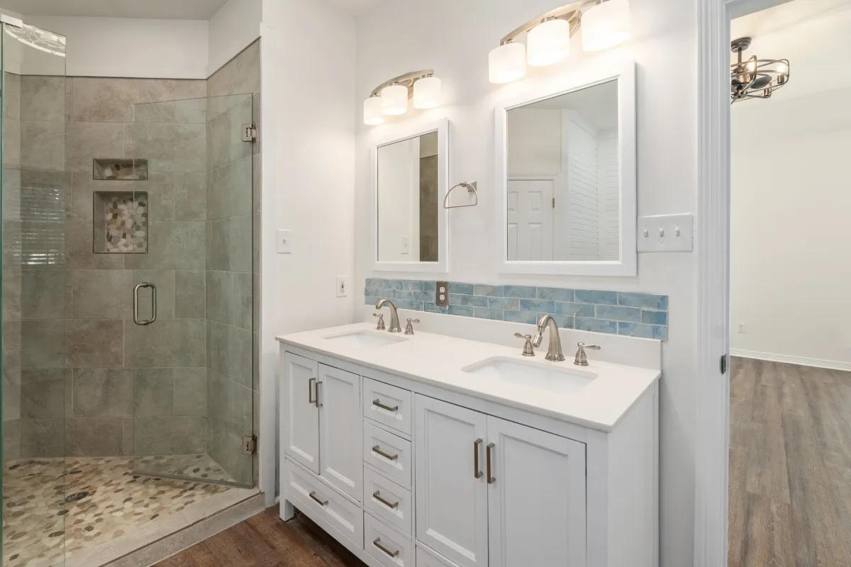 primary bath with separate shower and double vanity. Plus walk in closets.