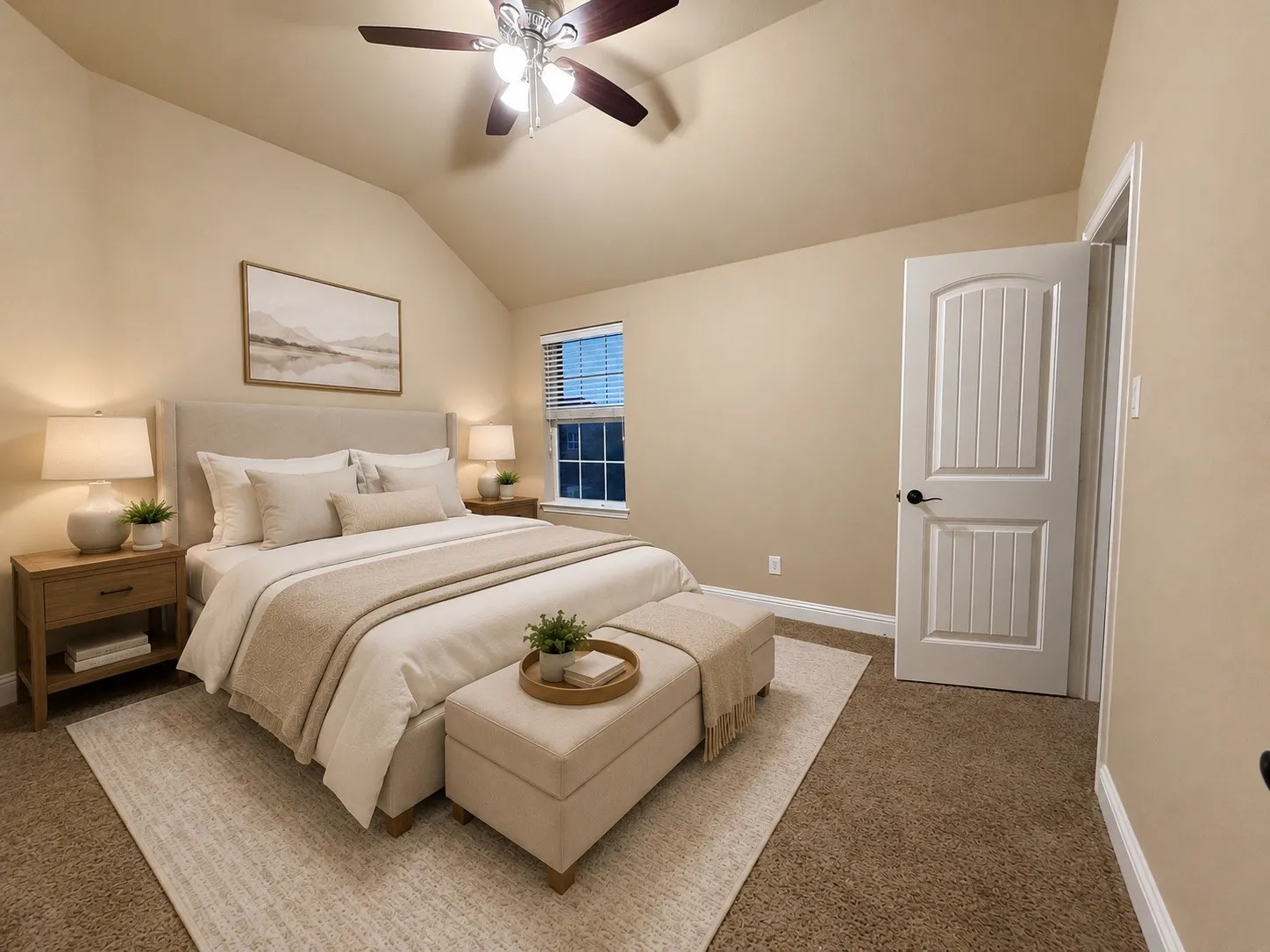 Carpeted bedroom featuring an angled ceiling and a ceiling fan with light fixture