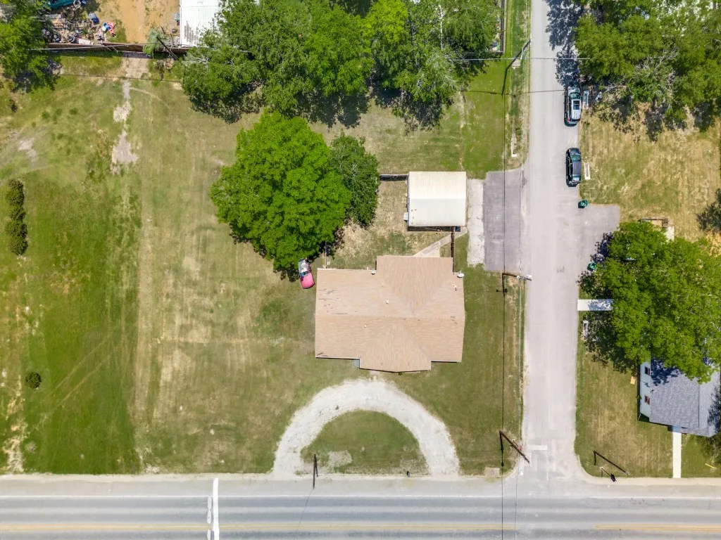 A birdseye of this prominent corner lot. Left is East, Right is West.