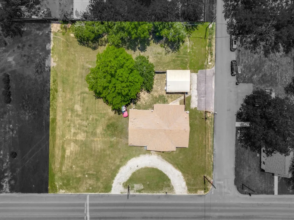 A birdseye of this prominent corner lot. Left is East, Right is West.