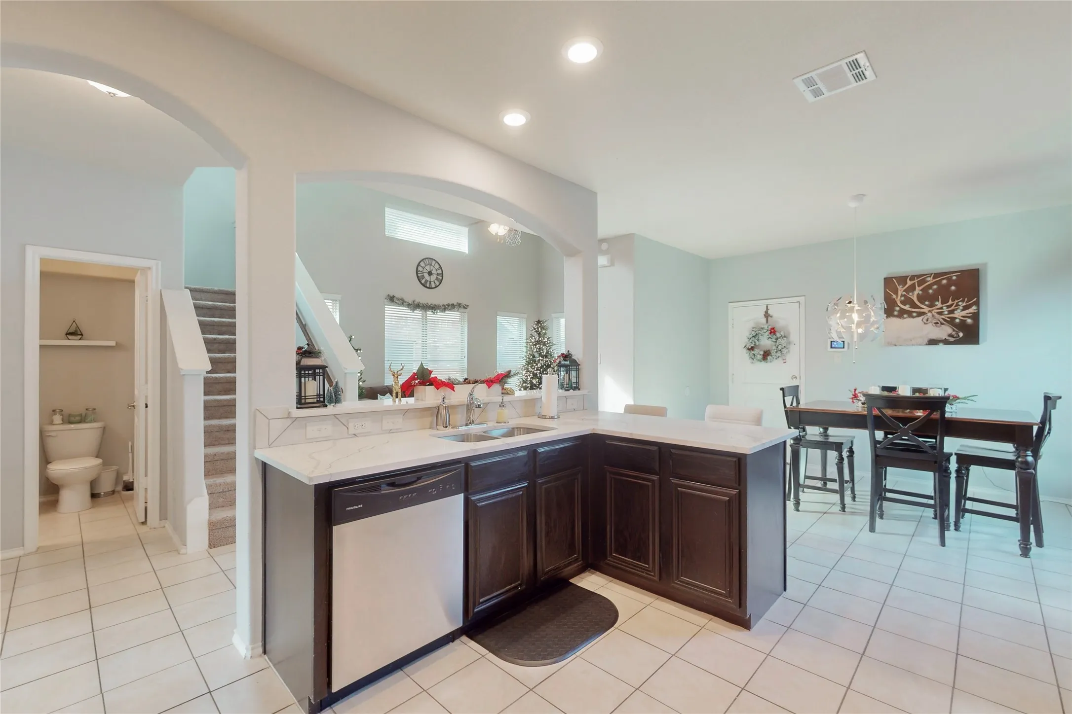 Impressive home with upstairs covered balcony.