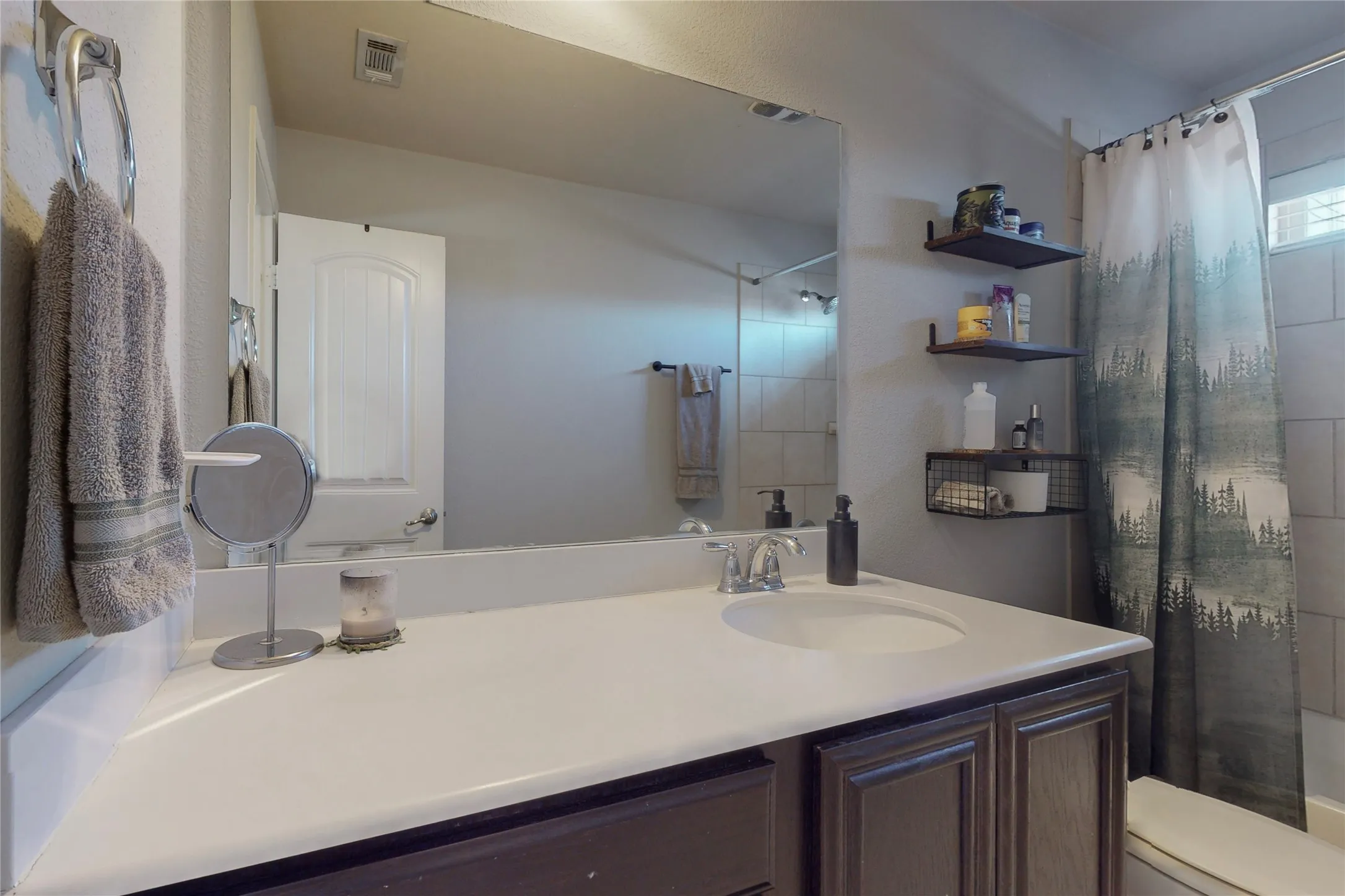 Nice counter space in second bath.