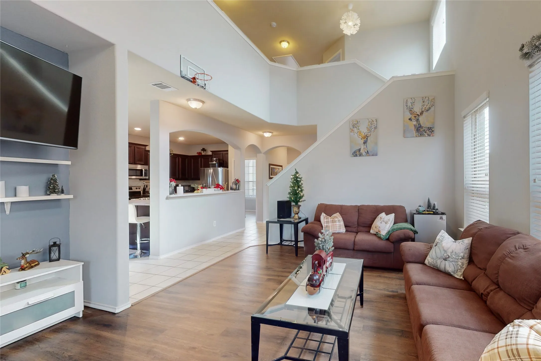 Grand living room, cozy and open.