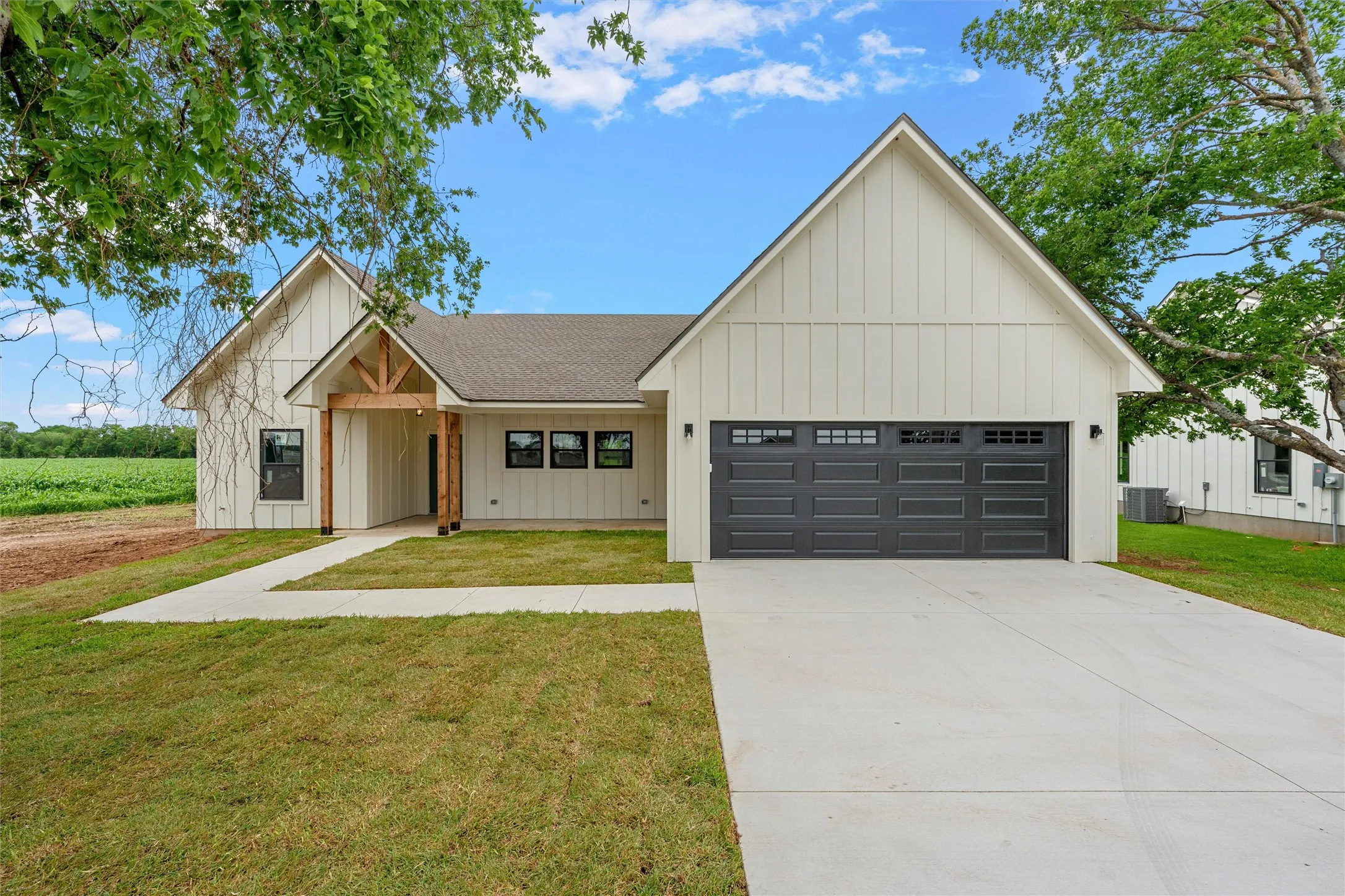 Modern farmhouse exterior featuring vertical board and batten siding