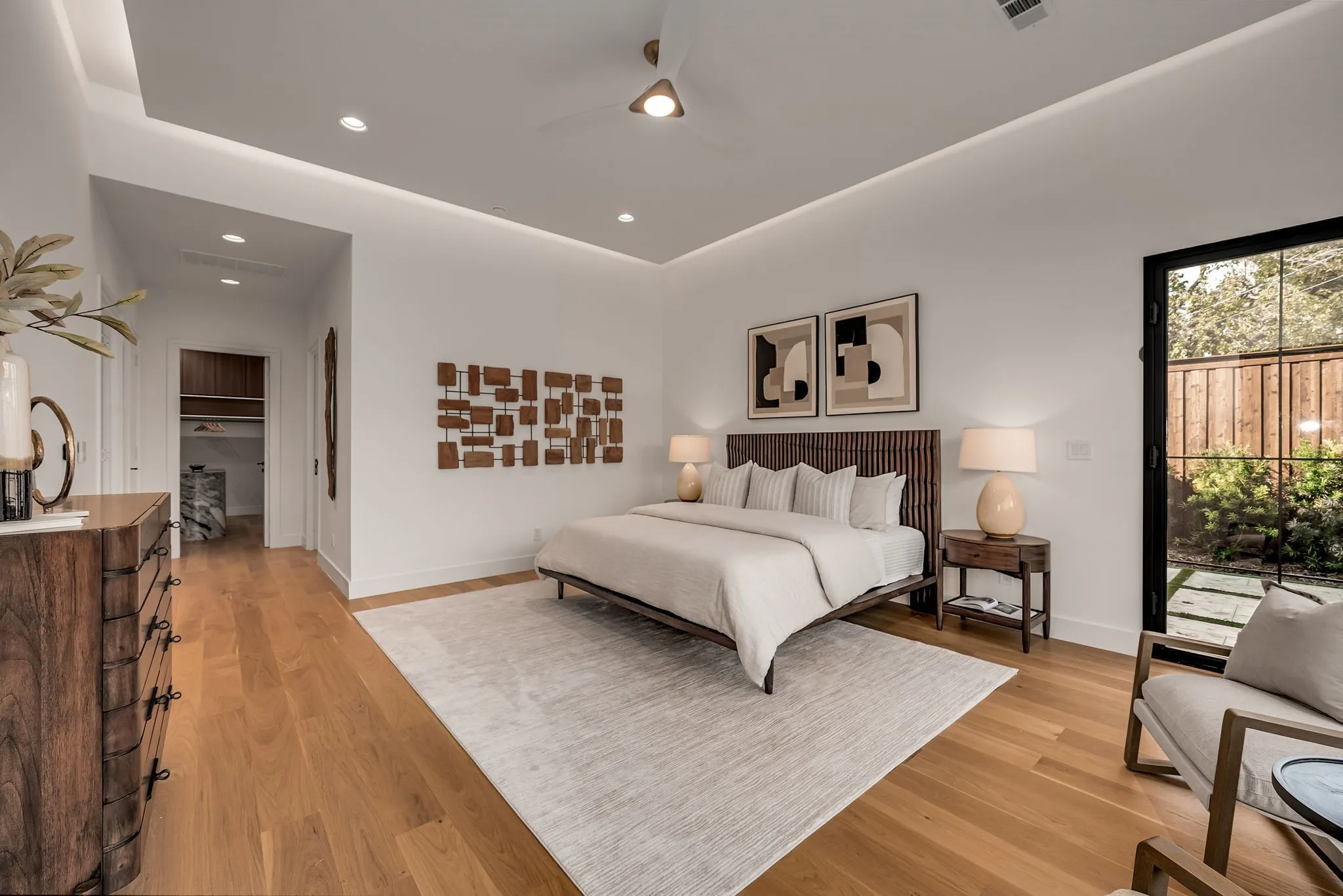 Bedroom with light wood-type flooring, recessed lighting, access to outside, and a ceiling fan
