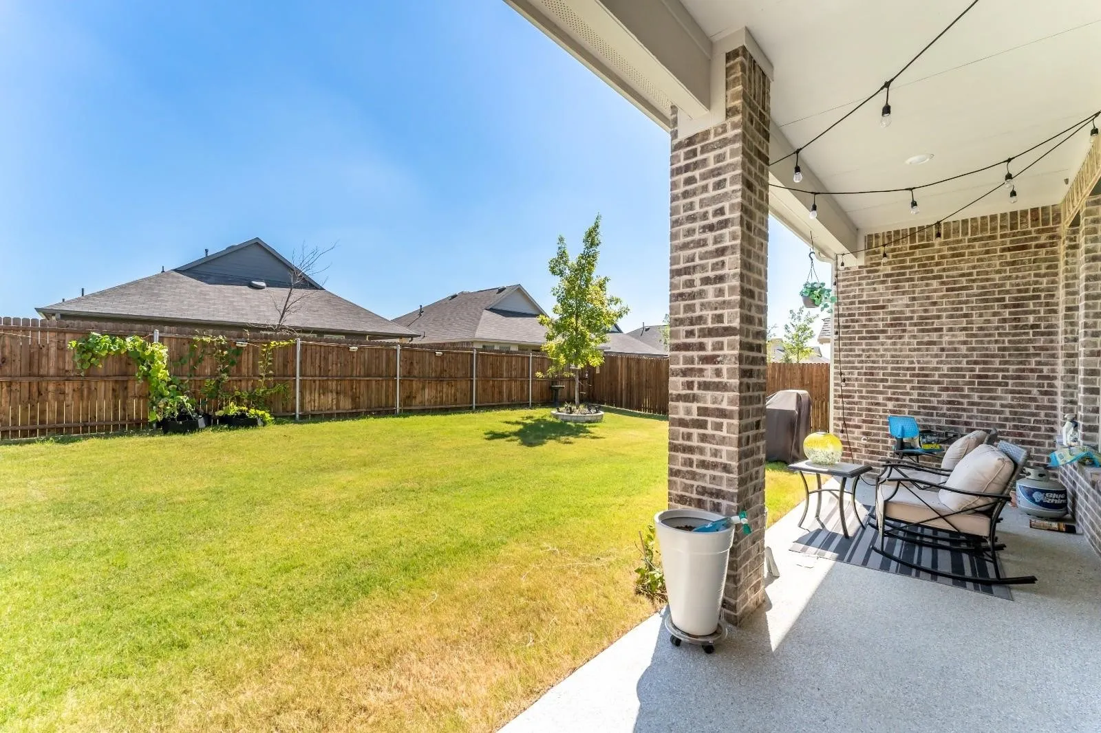 View of yard with a patio