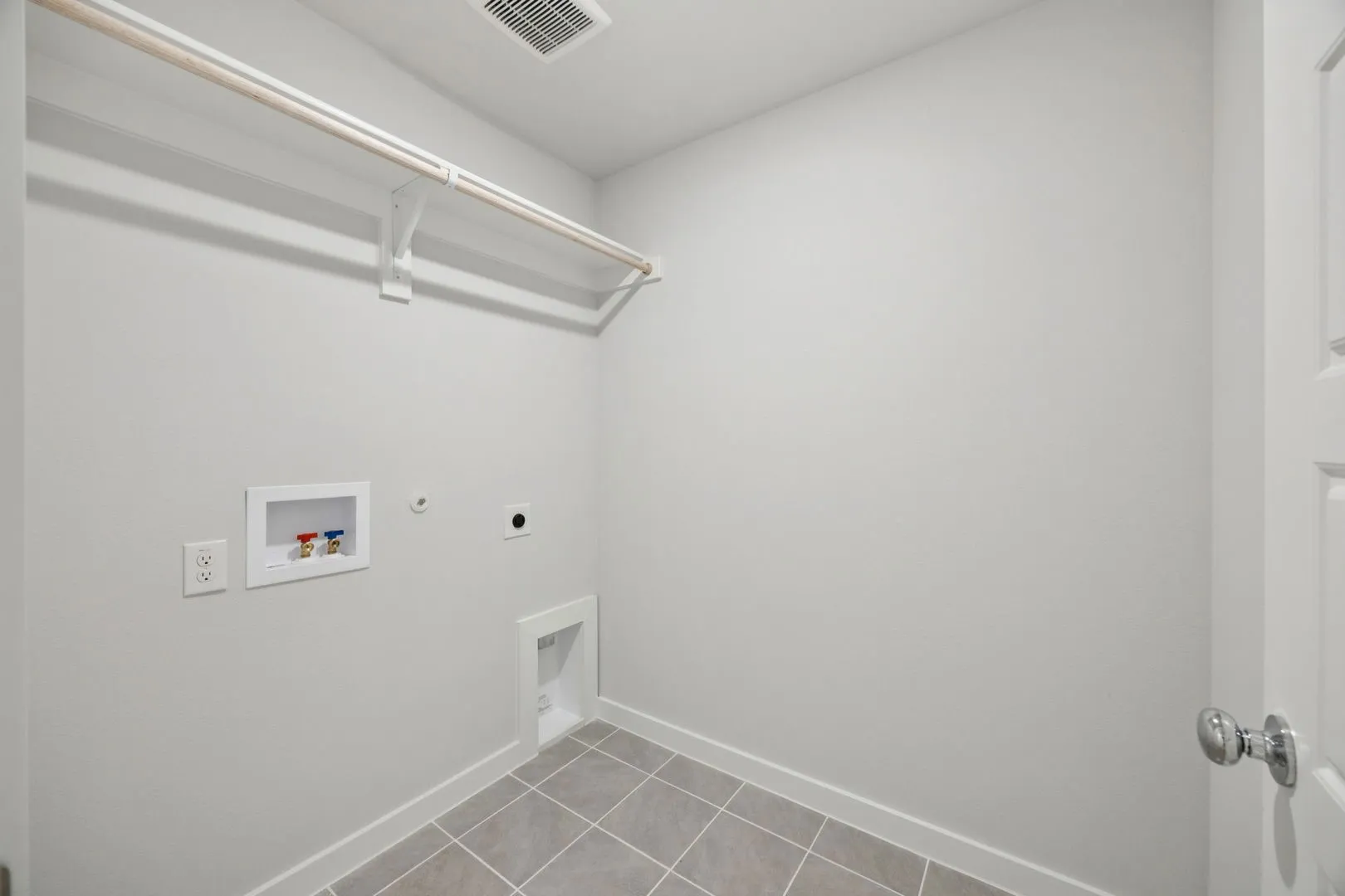 Utility Room in the Hadley home plan by Trophy Signature Homes – REPRESENTATIVE PHOTO