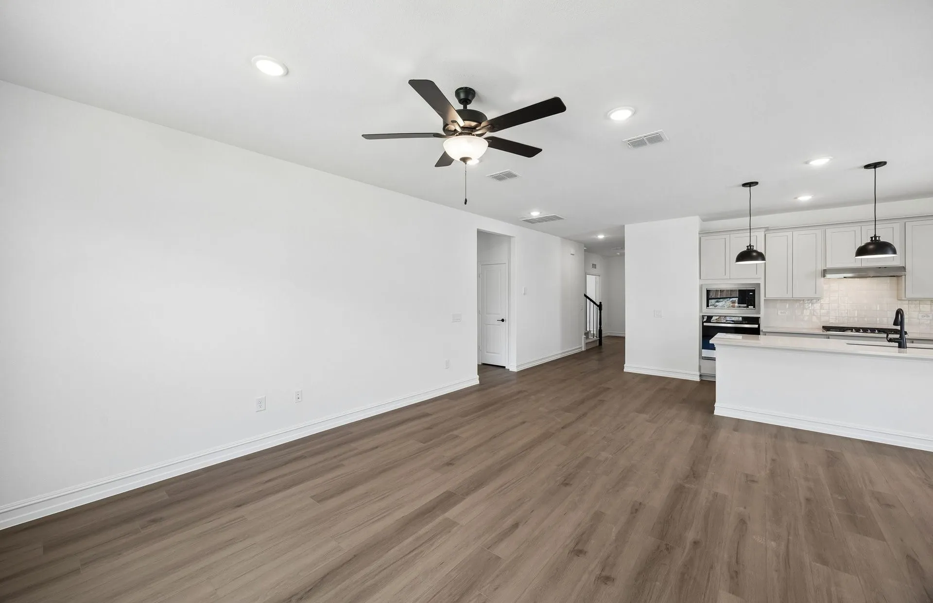 View of kitchen from gathering room