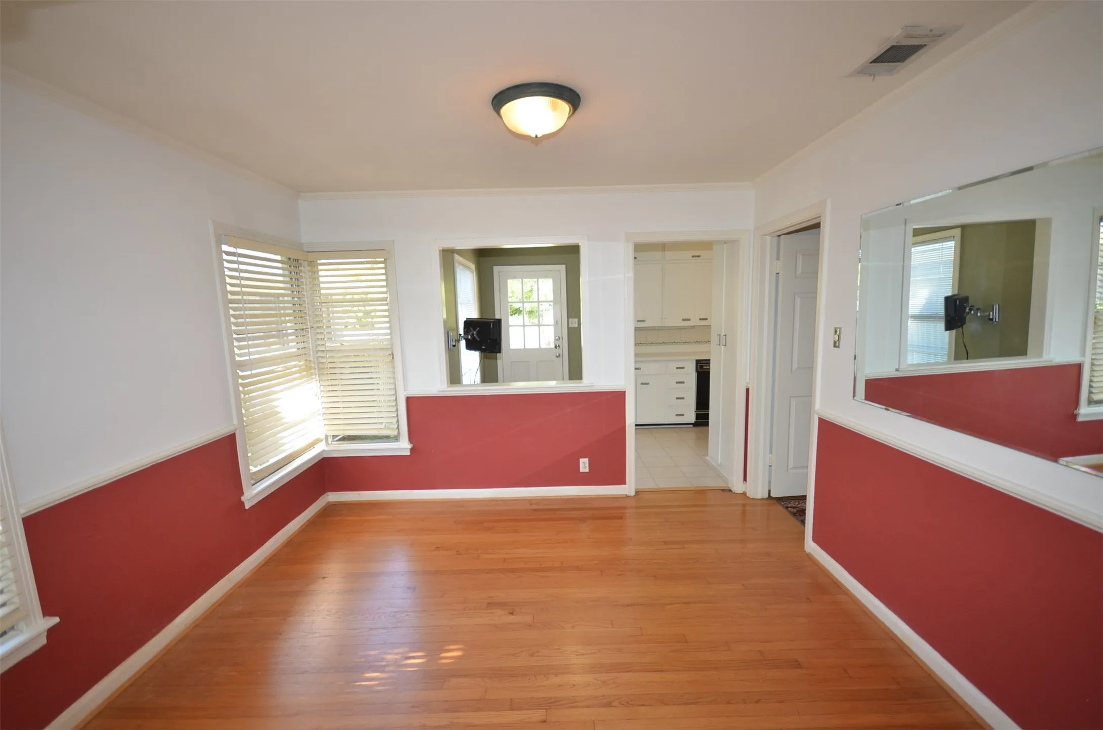 Hardwood-finish flooring throughout the space