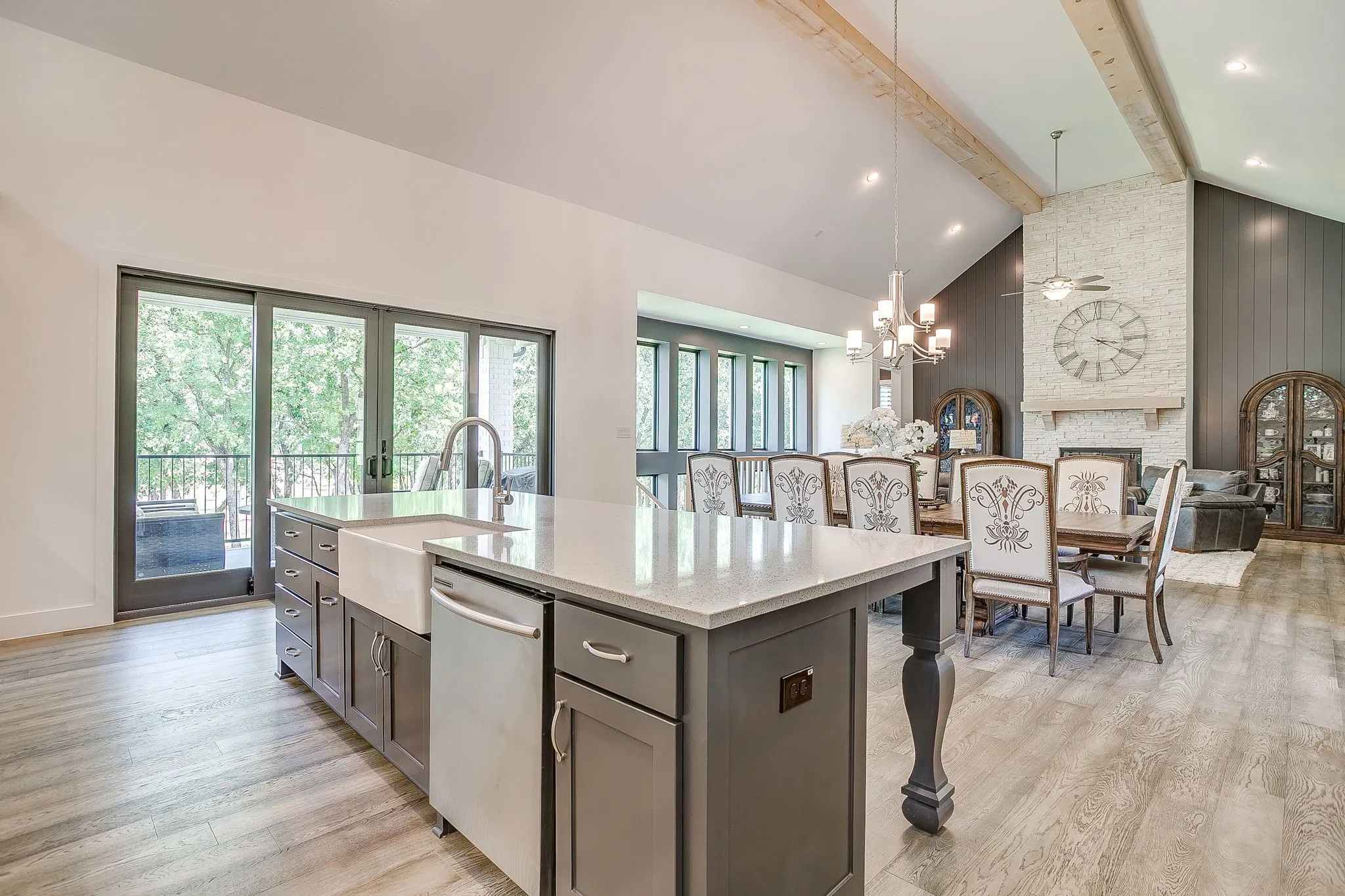 Kitchen with glass doors that lead to balcony.