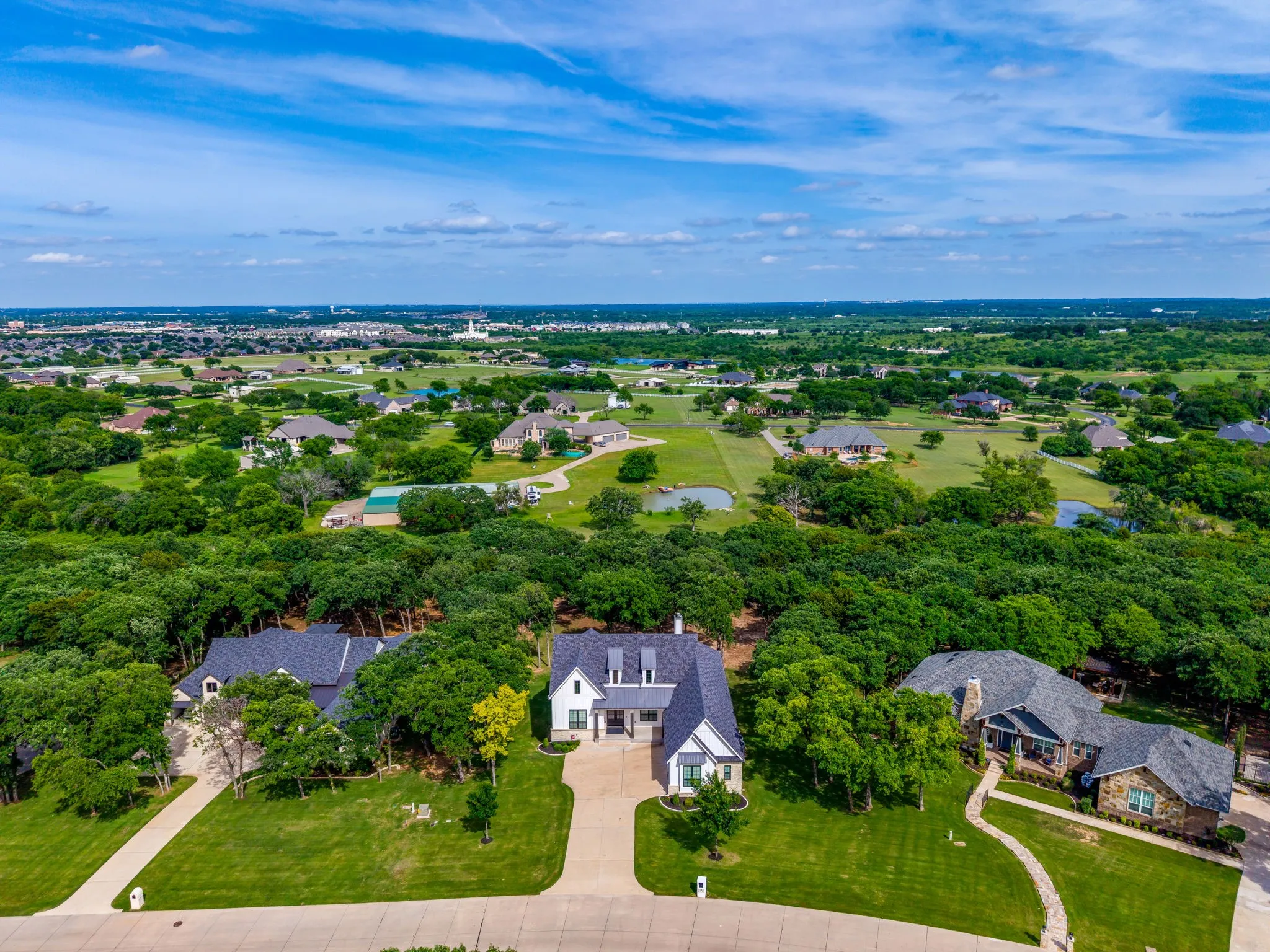 Aerial view of home and neighborhood