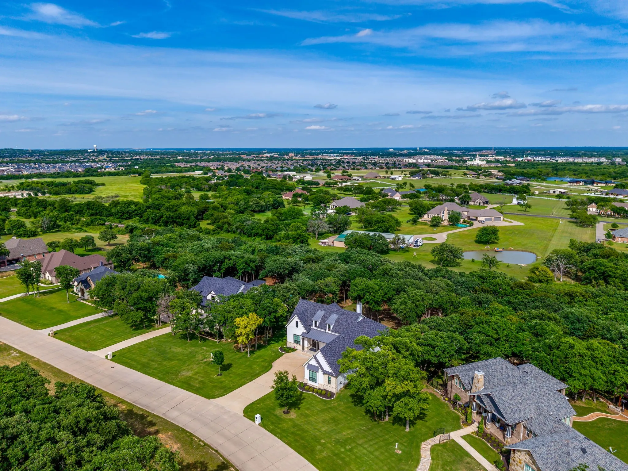 Aerial view of home and neighborhood