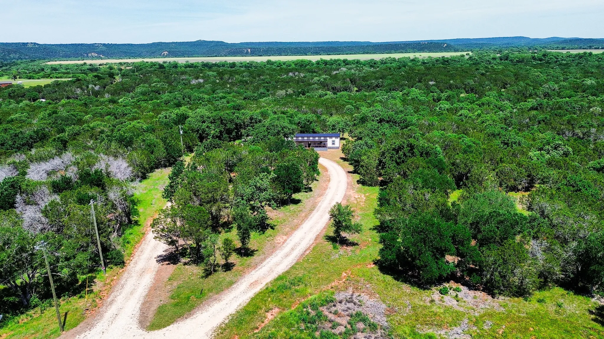 Single Family Residence For Sale in Palo Pinto County , 180 Wooded Crest, Palo Pinto, Texas 76484, 2 Bedroom, 2 Bathroom, Garage spaces, 1,080 Sqft, built in 2022, Preowned, mls#21251706, Real Estate Agent in Palo Pinto, Homes For Sale in Palo Pinto county, Homes For Sale in Palo Pinto, Realtor in Palo Pinto Texas, Real Estate Brokerage Independent Realty Texas, Luminita Cordes Realtor