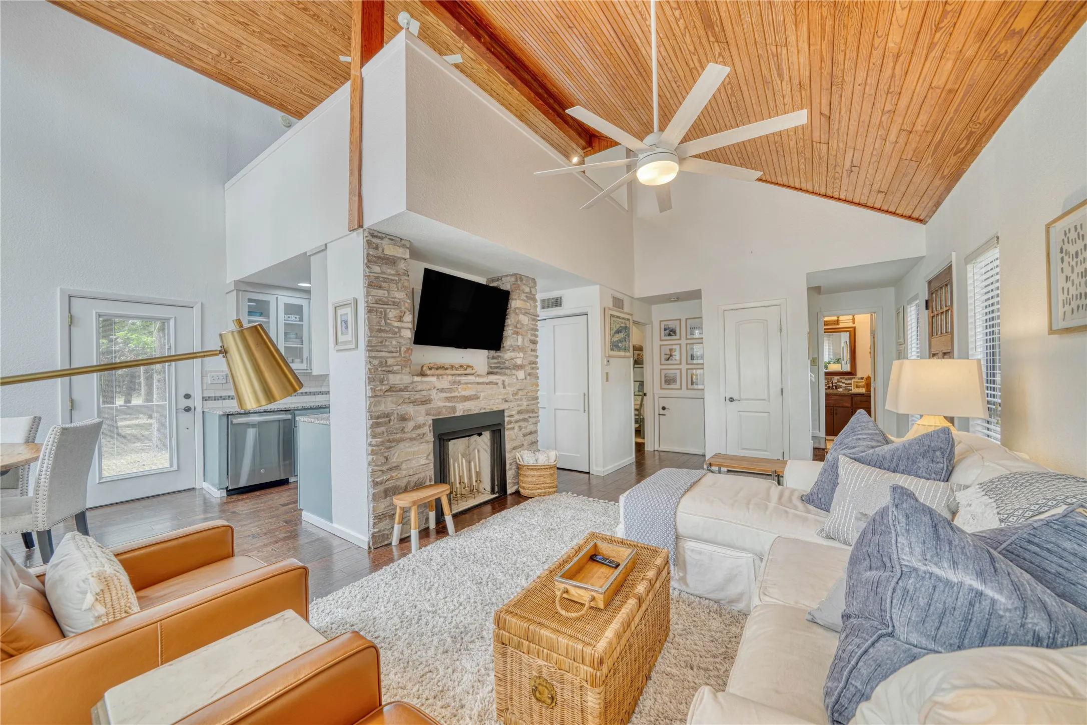 Vaulted wood-paneled ceiling with exposed beams
