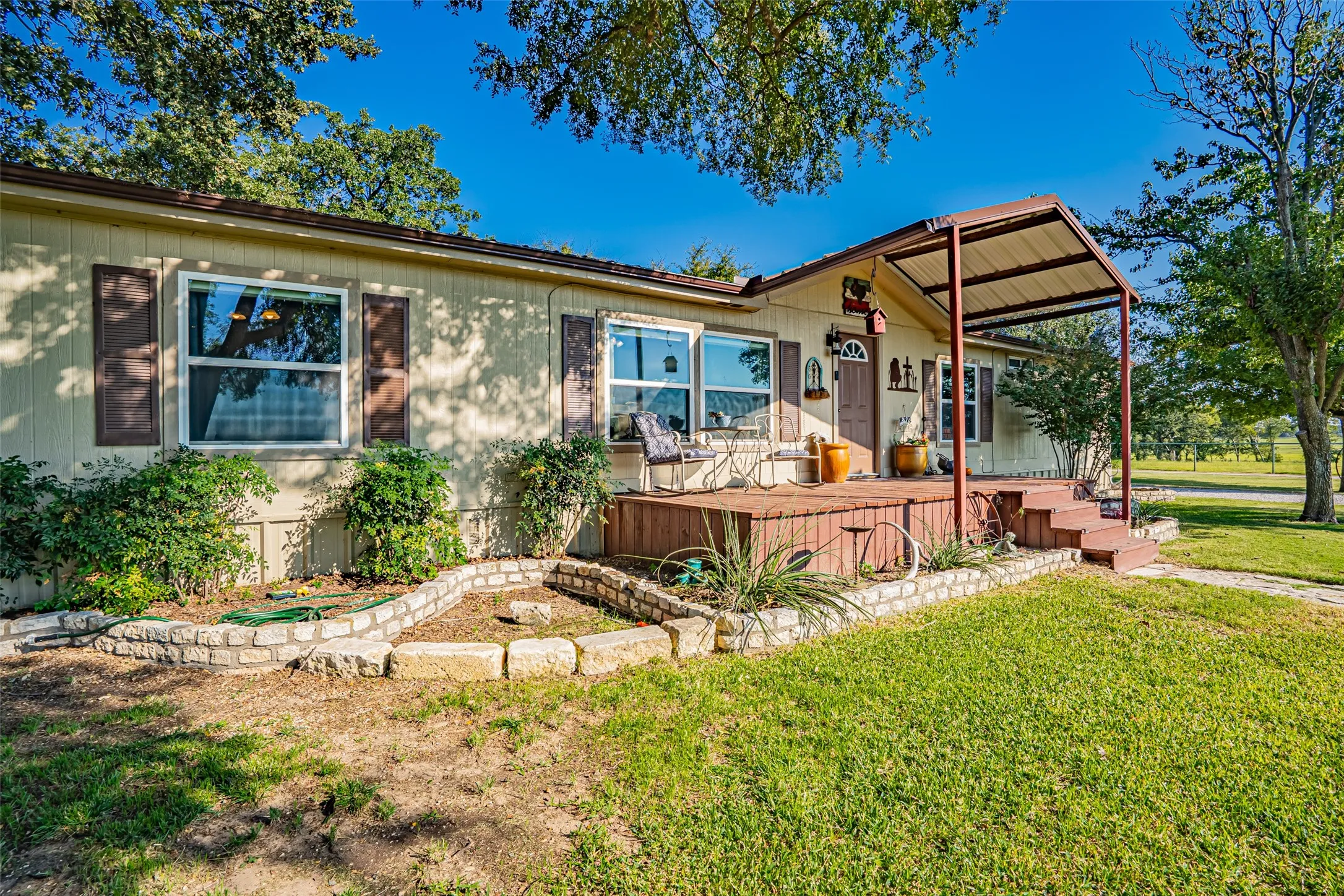 View of front of property with a front yard.