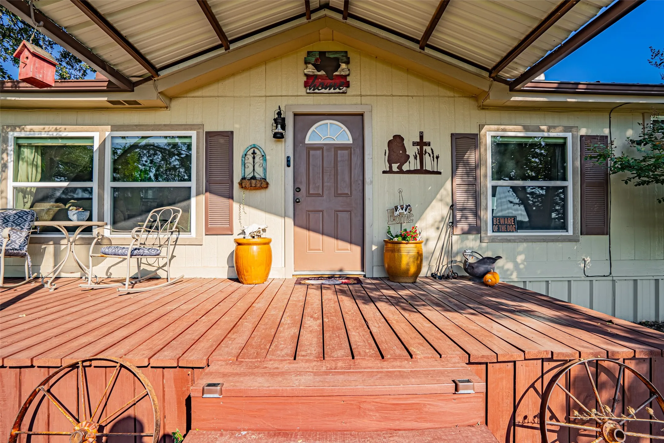 Entrance with soaring porch.