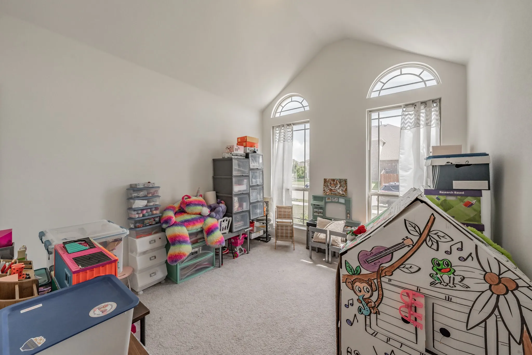 Playroom with carpet flooring is bedroom #3.