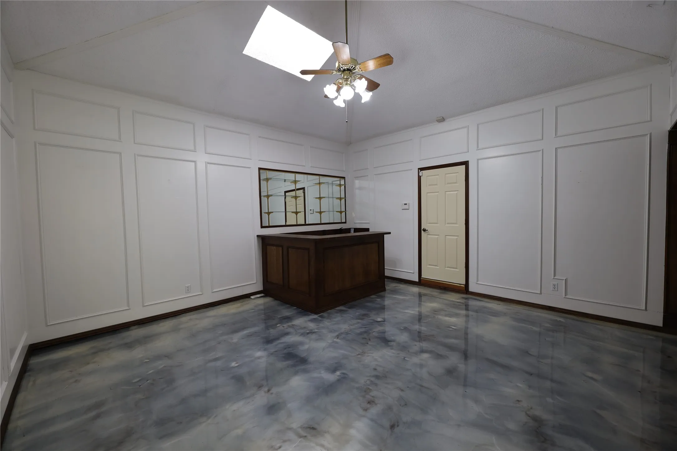 Play room with a wet bar