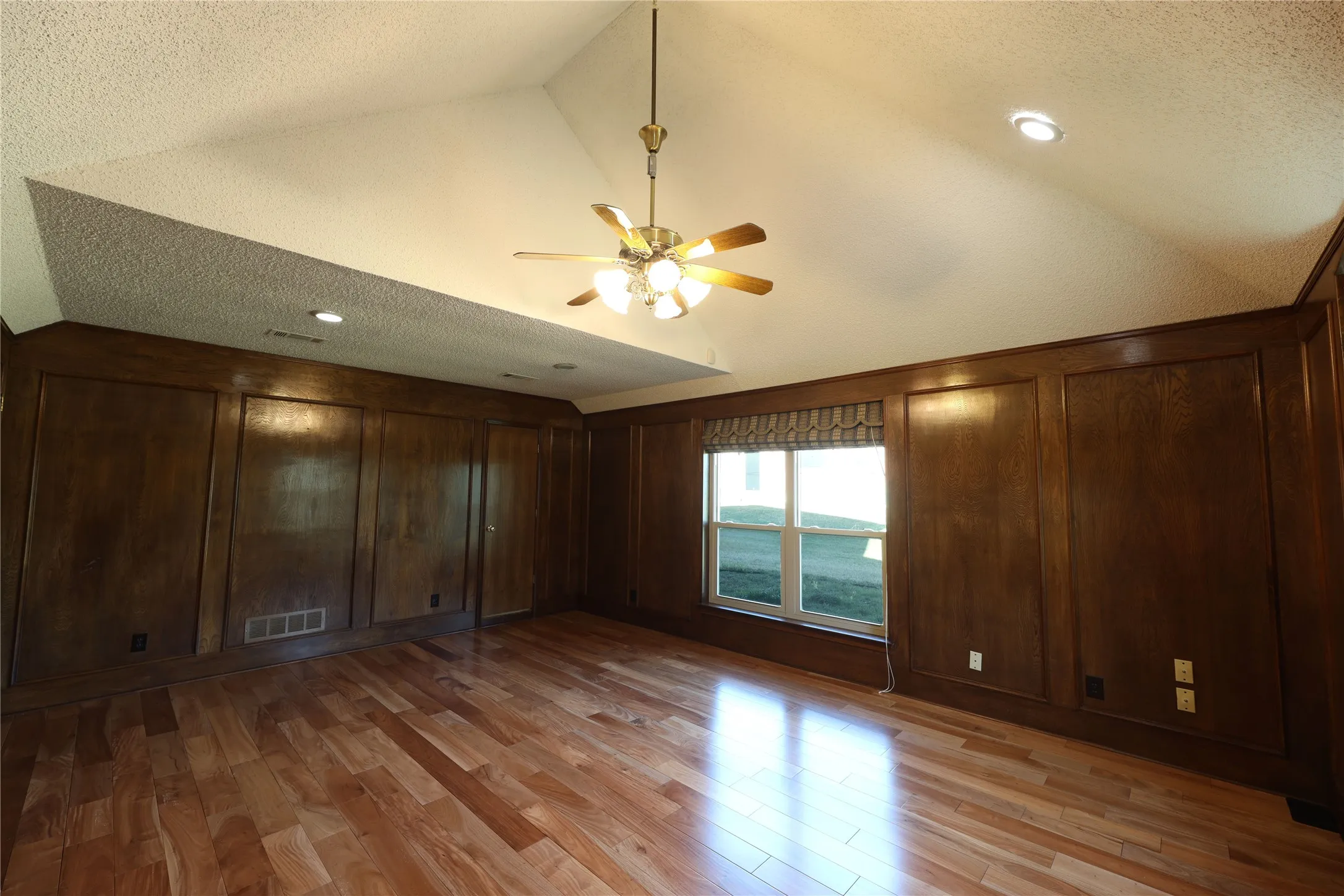 Formal Studio wood accents, vault ceiling