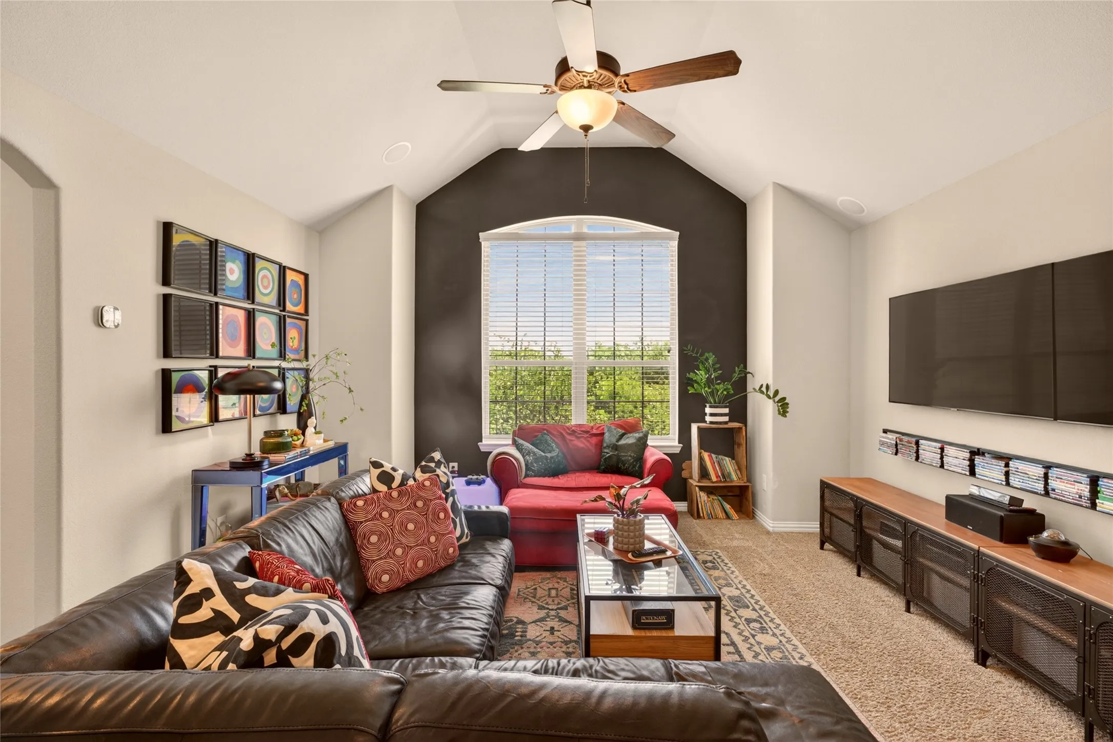Upstairs game room provides flexible space for relaxing, entertaining or movie nights.