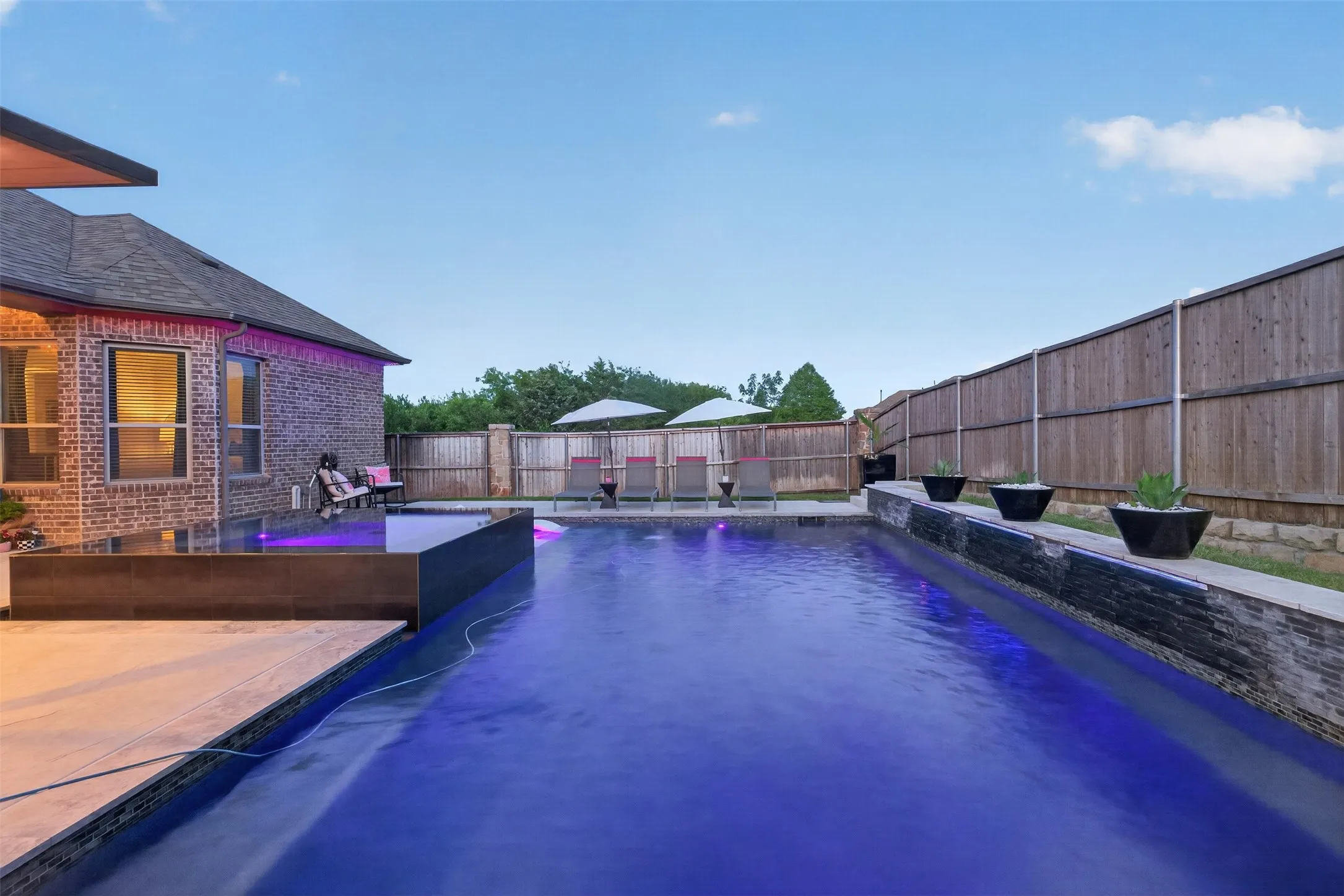 Expansive pool provides room for swimming, recreation and relaxing at home.