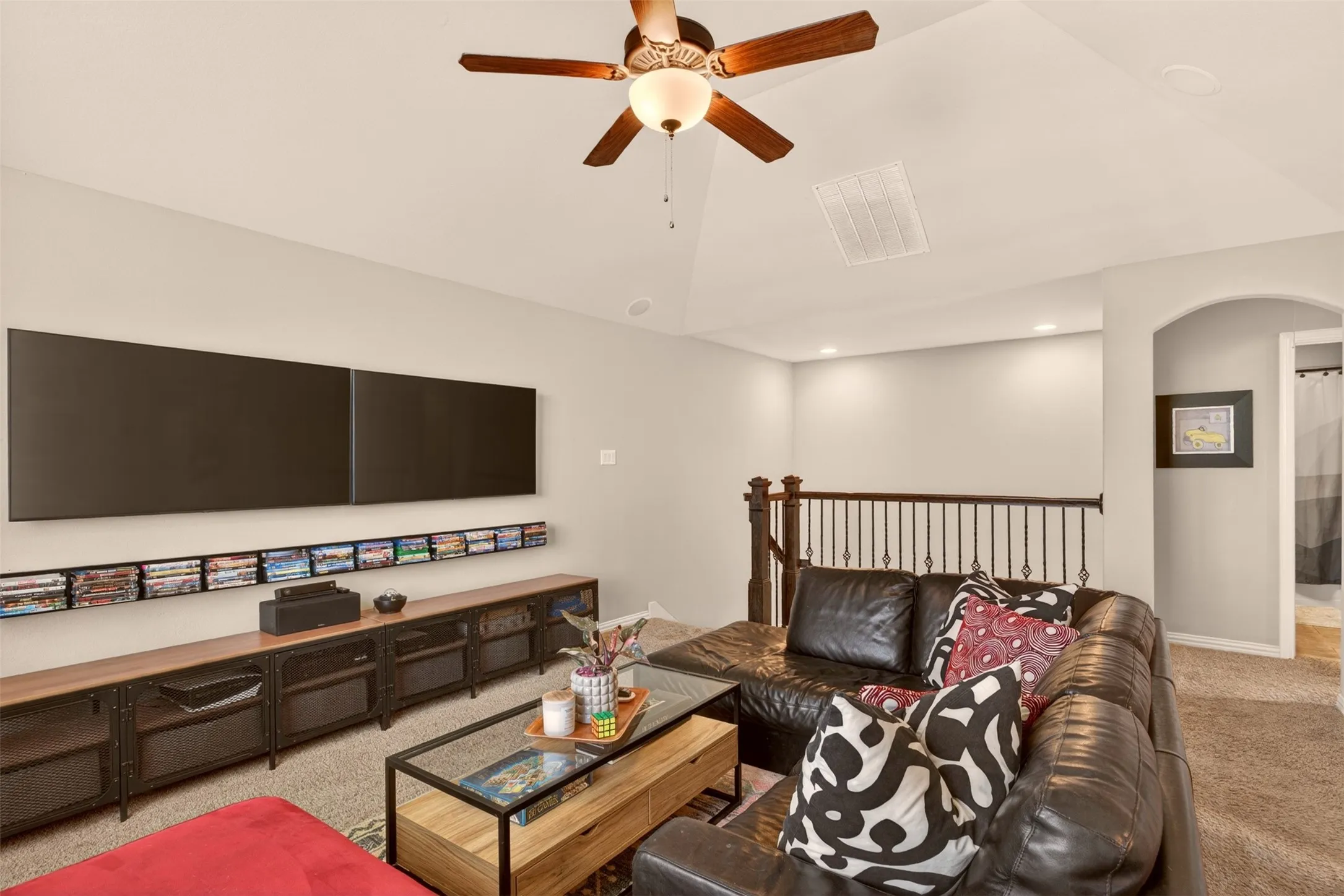 Open upstairs game room creates a comfortable second living and entertainment space.