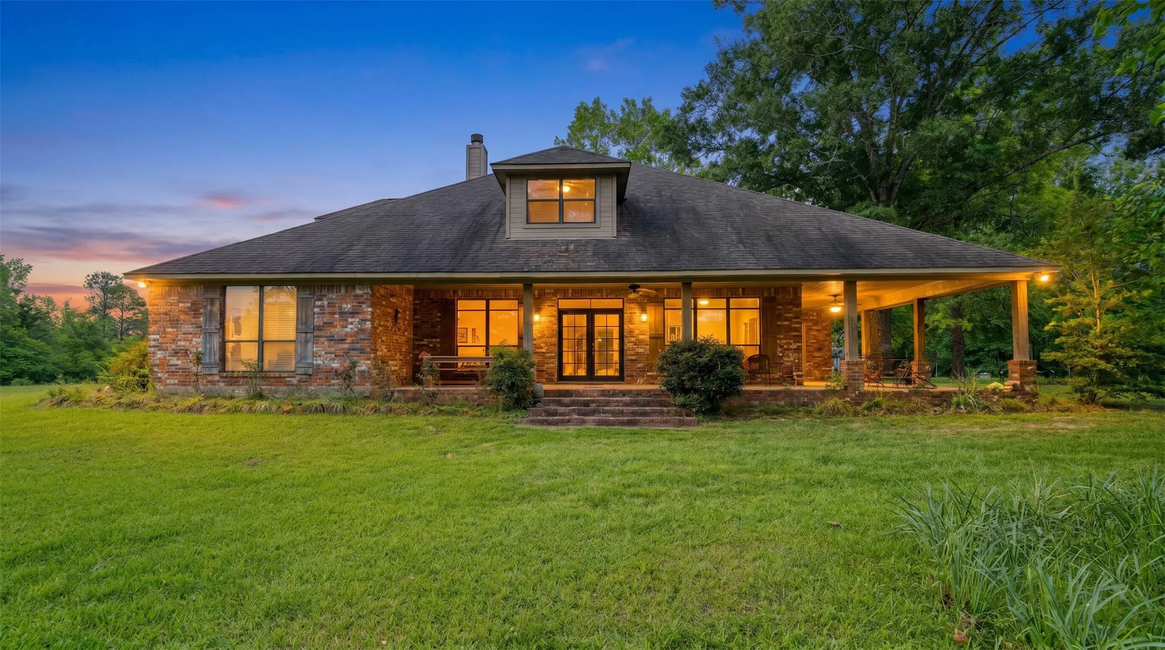 Beautiful porch carefully designed to capture the views and breeze even in peak summer afternoons!