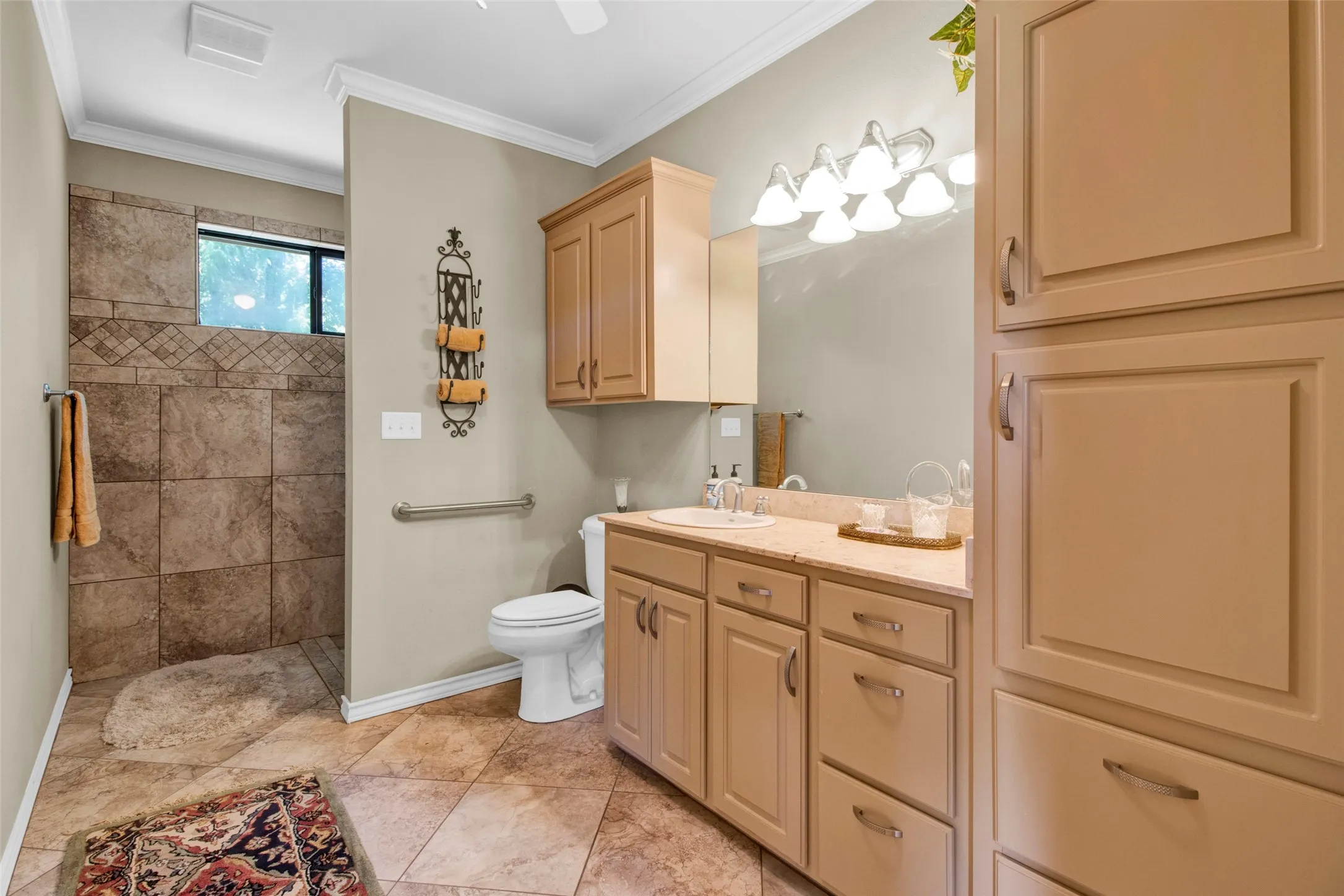 Full Bath located on main floor between Bedrooms 2 & 3 - with fully accessible Shower