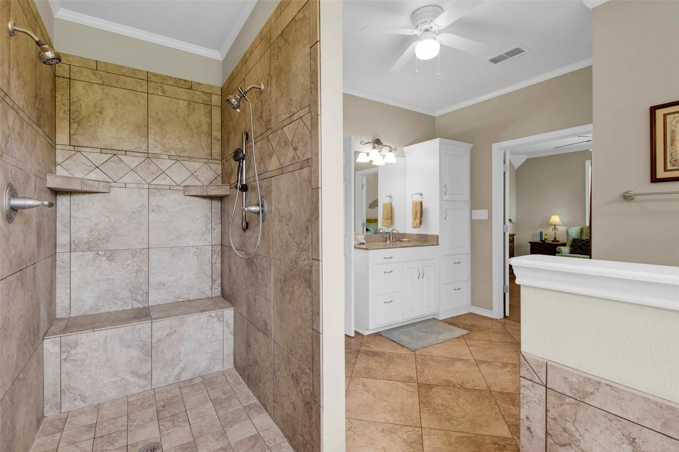 tiled shower creates an ease of access so that all generations can feel comfortable living and using this home