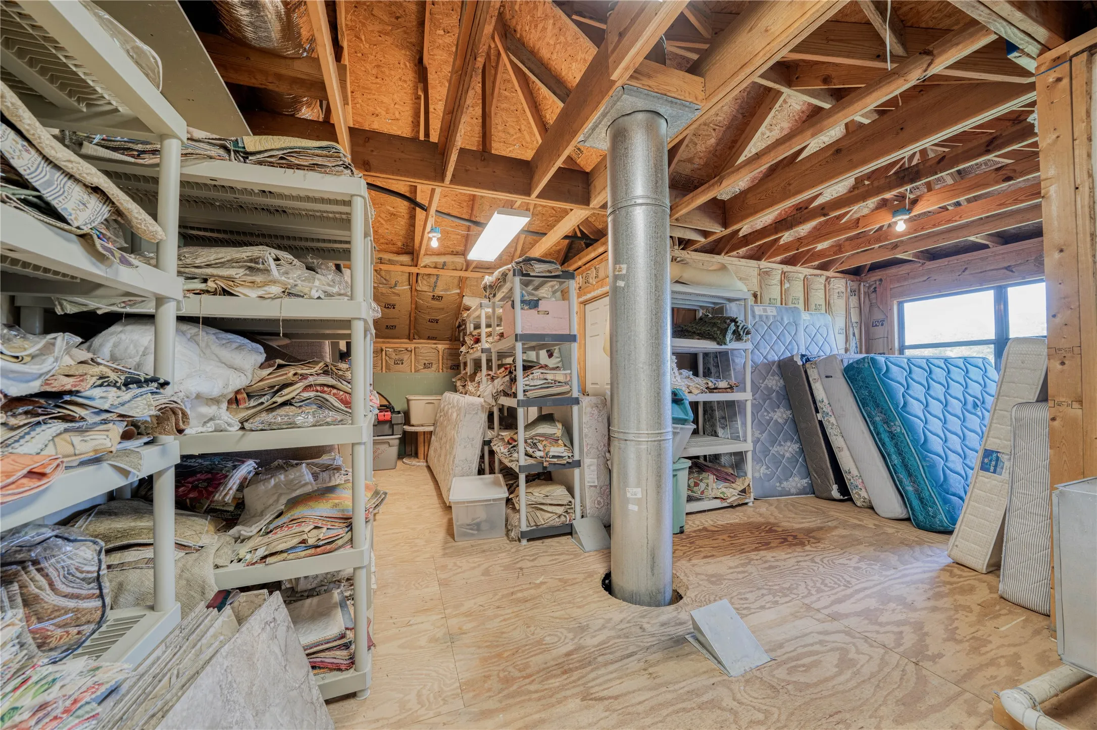 Unfinished attic with flooring is currently space for all the extras - could be finished out for another bedroom if needed.