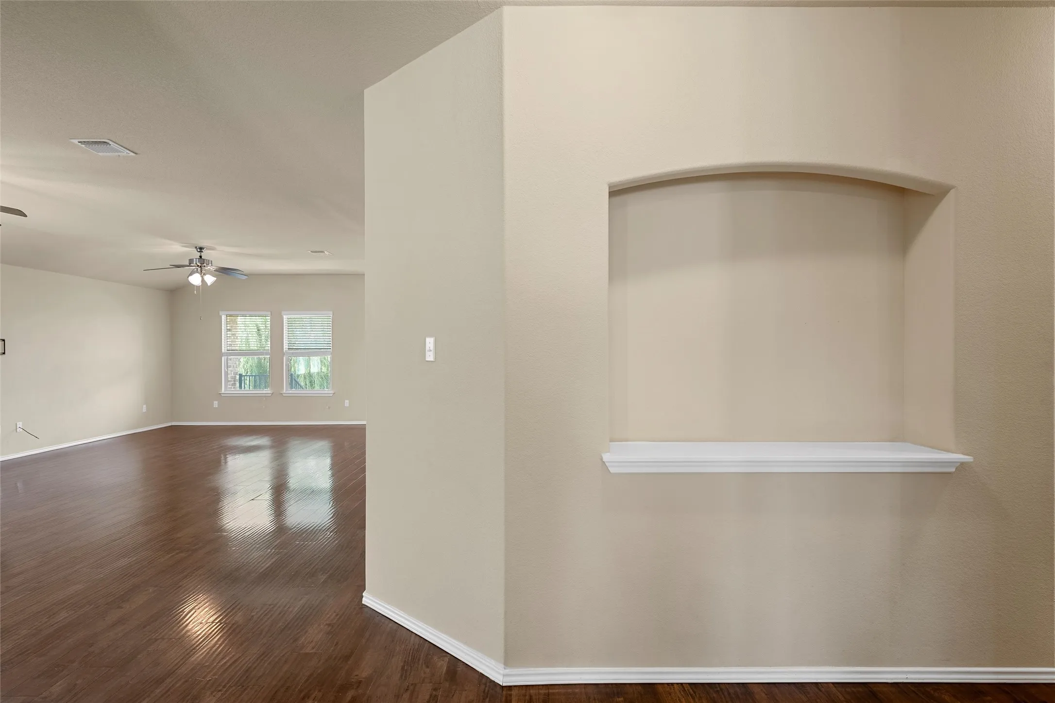 Recessed wall niche with a white display shelf