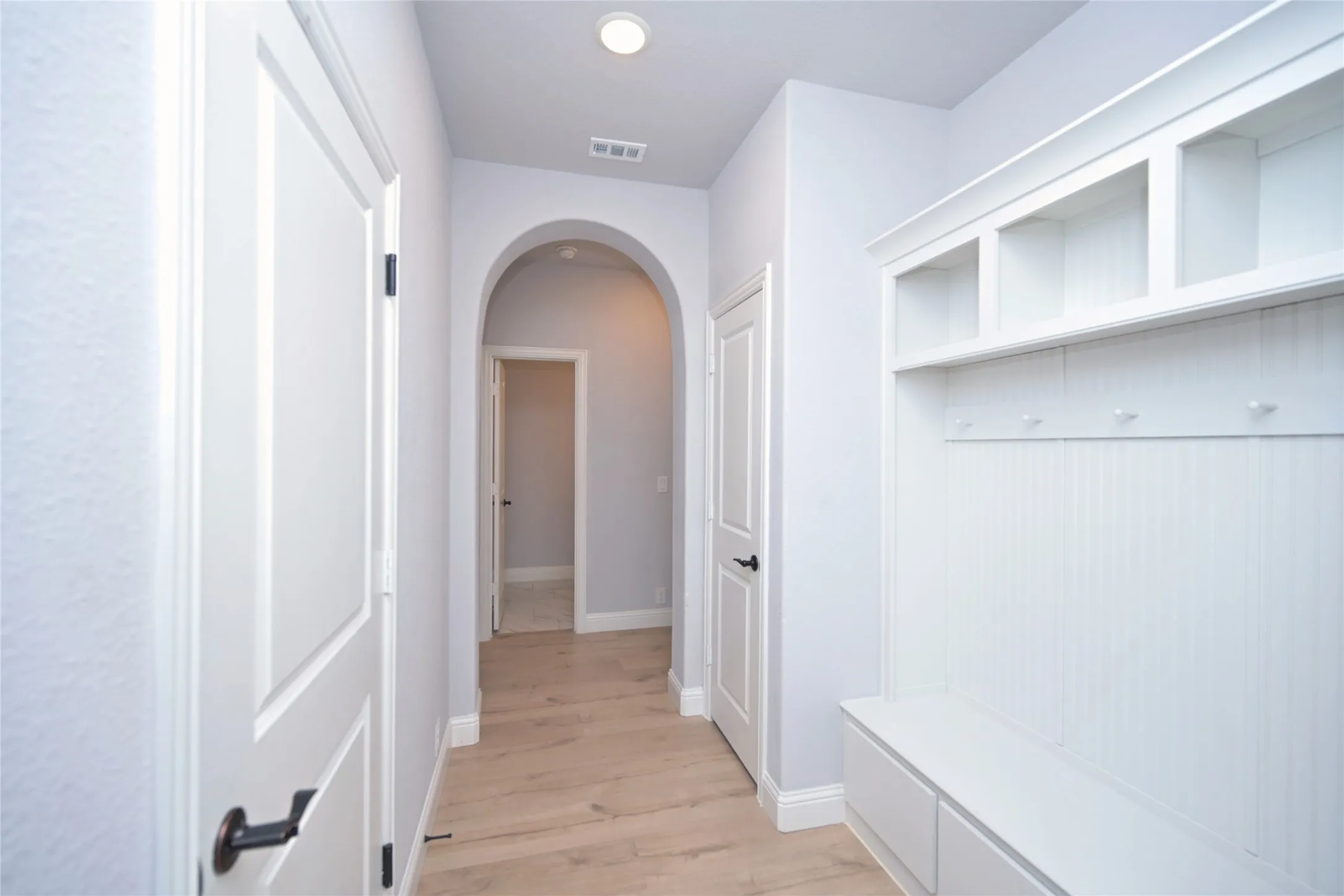 Mud Room with lower built-in storage drawers