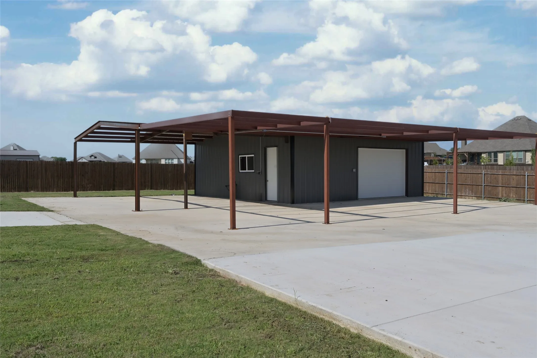 Side View of Work Shop & numerous additional parking spaces