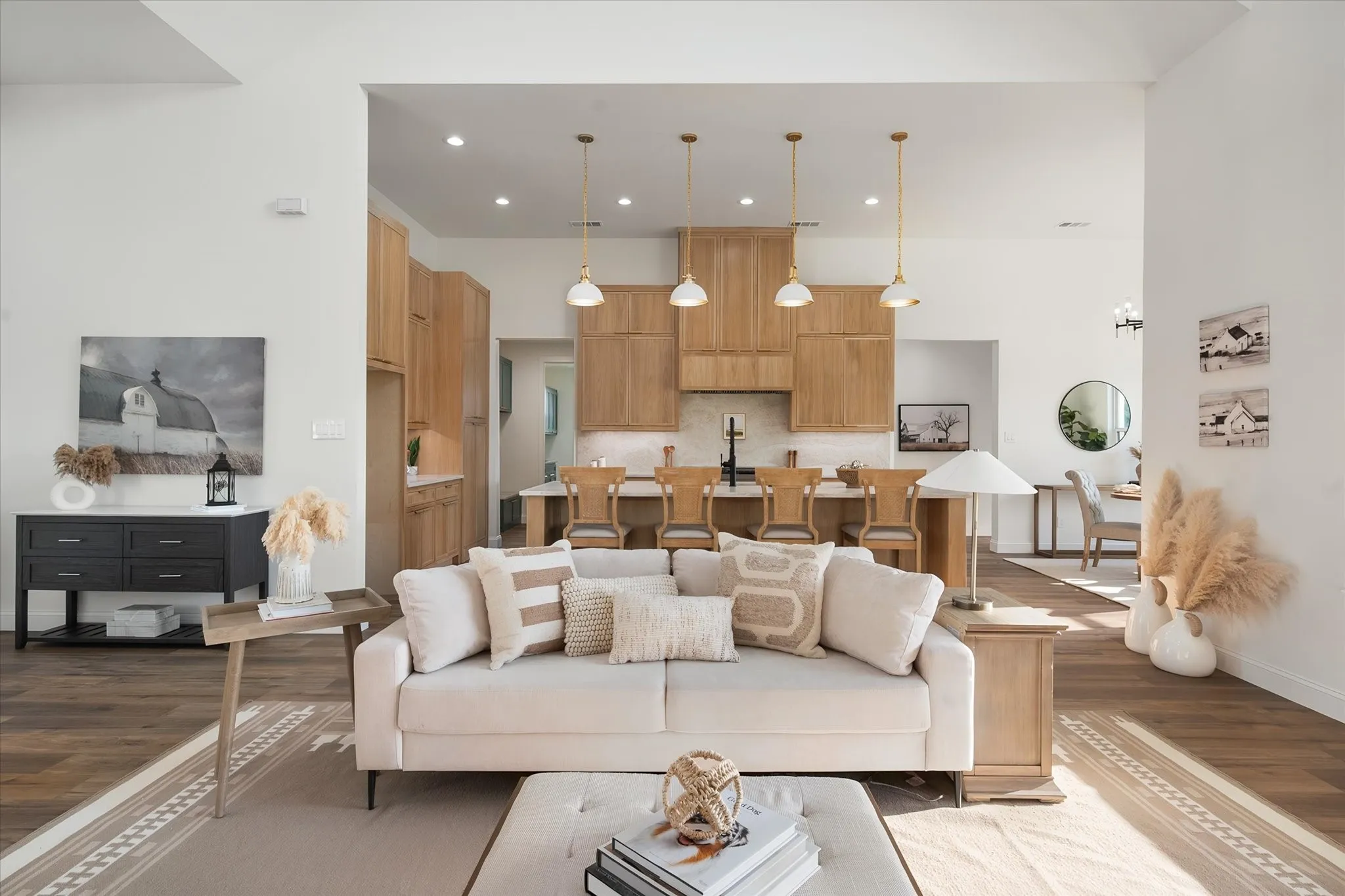 Open-concept living space provides a seamless connection to the large designer kitchen.