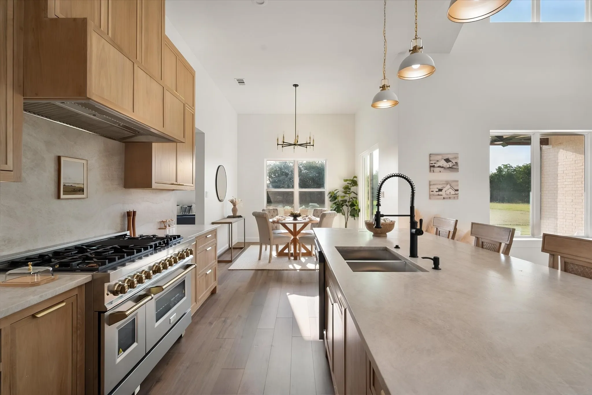 Designer kitchen pairs generous counter space with custom cabinetry and stylish modern fixtures.