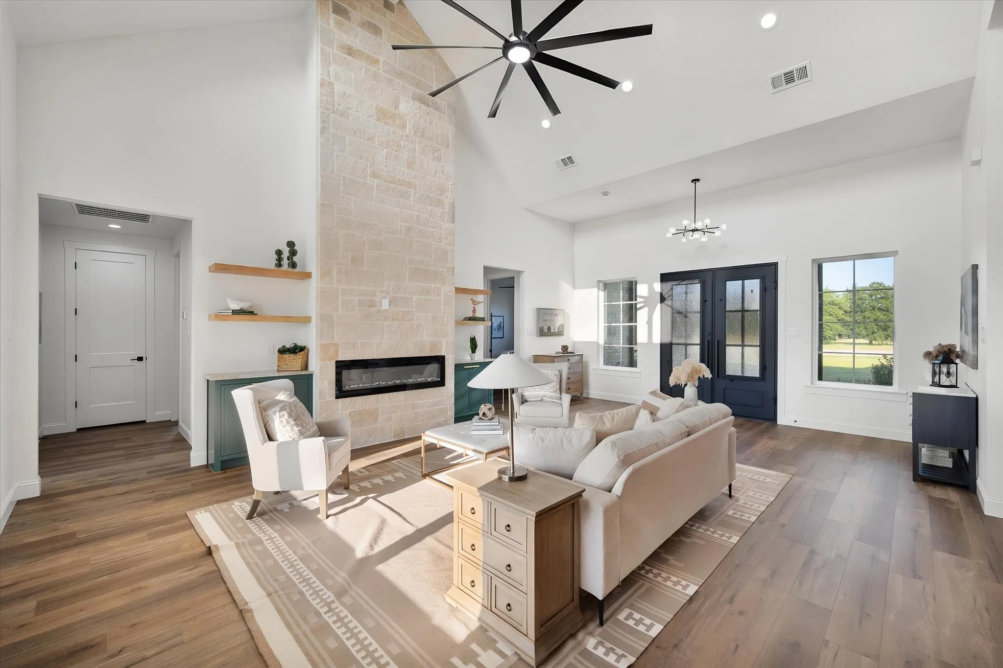 Expansive living room offers comfortable gathering space and easy flow throughout the home.