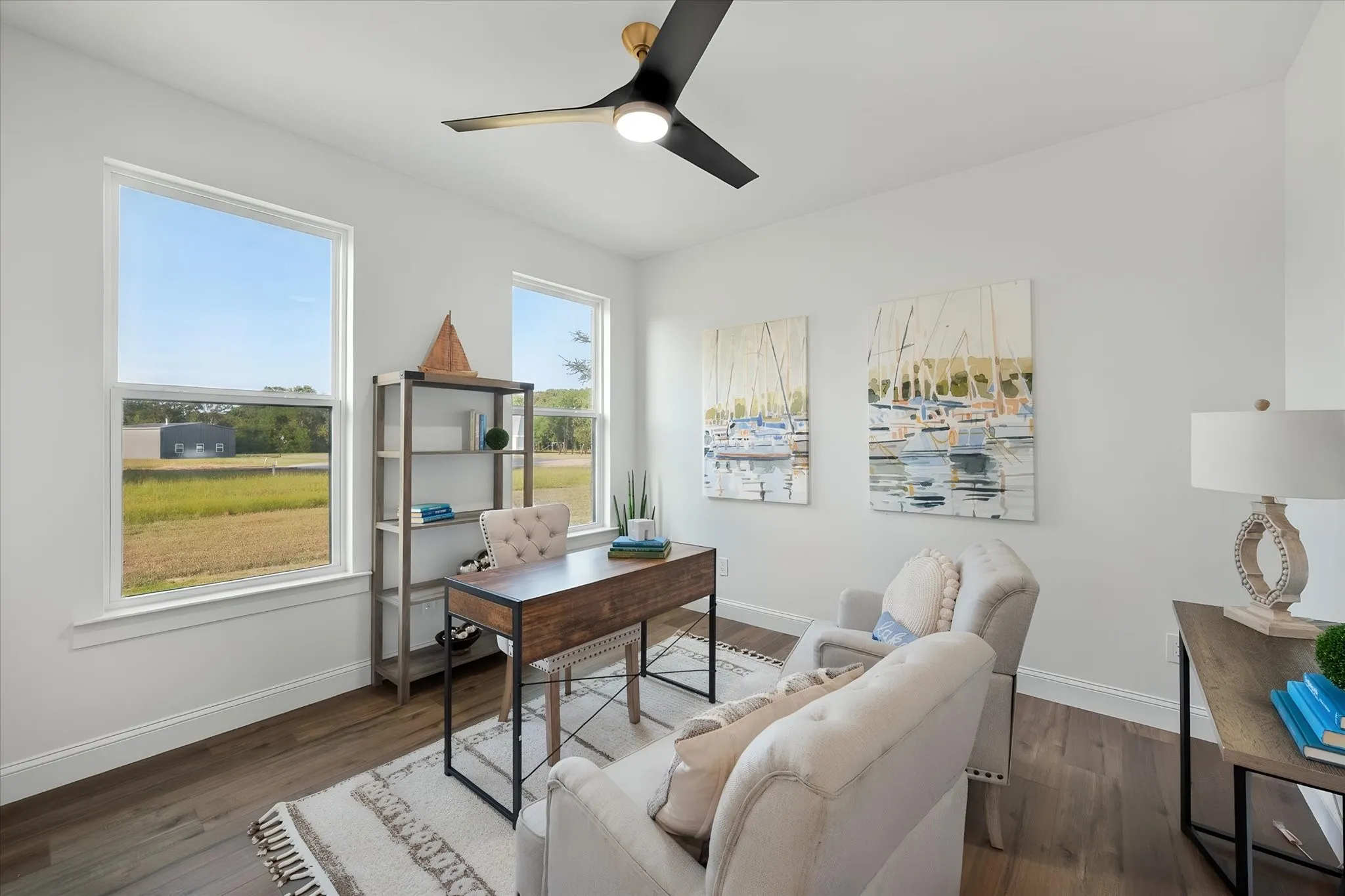 Versatile additional bedroom offers abundant natural light and space for guests, work, or hobbies.